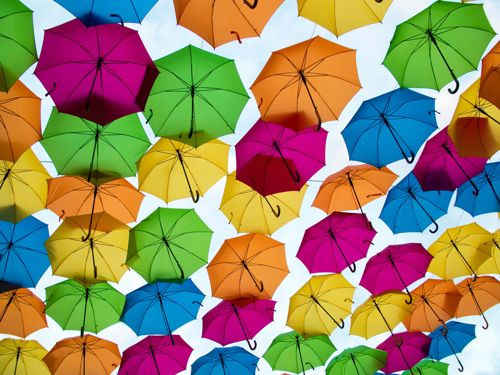 Repetitive Colorful Umbrellas [wallpaper] Background