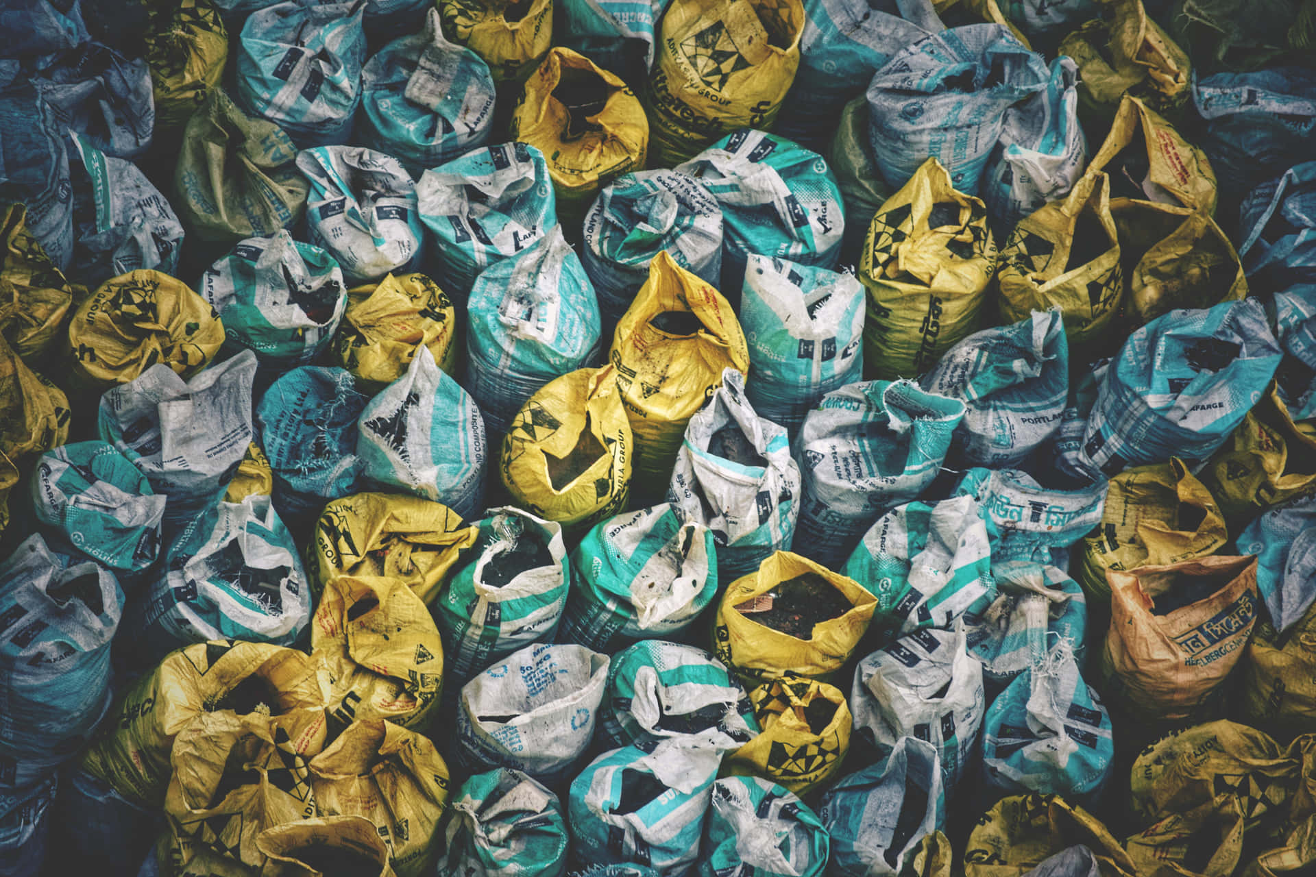 Repetitive Yellow Sacks [wallpaper] Background