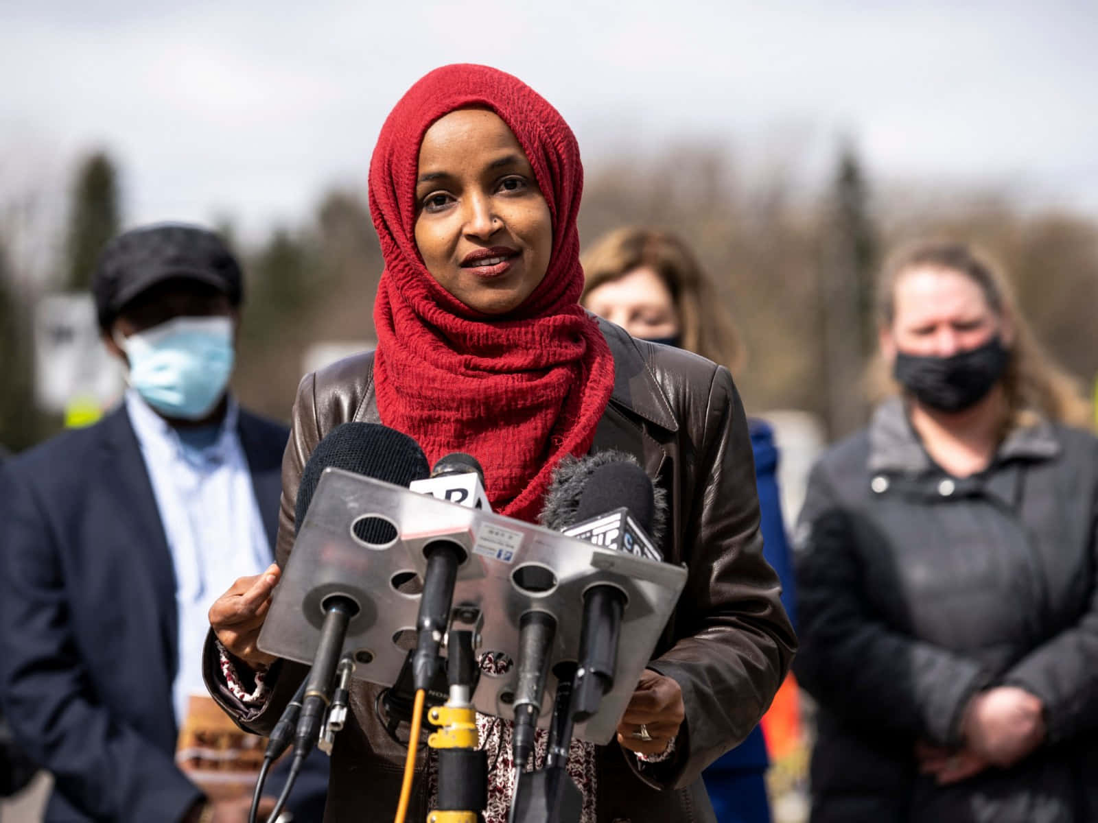 Representative Ilhan Omar In A Vibrant Red Hijab