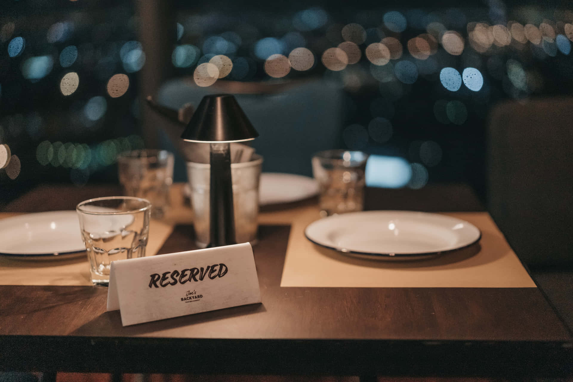 Reserved Sign In A Fancy Restaurant Background