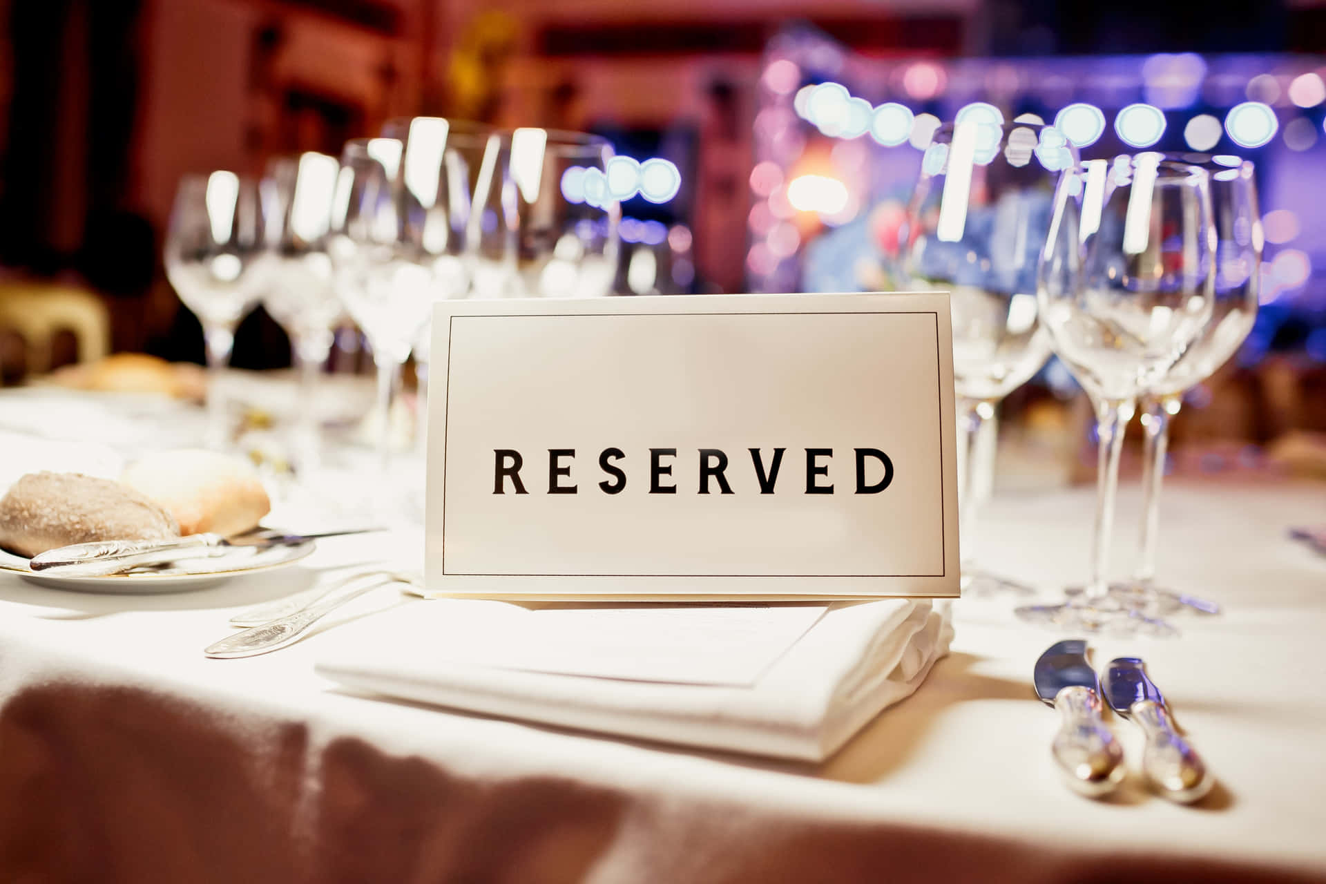 Reserved Sign On The Table Background