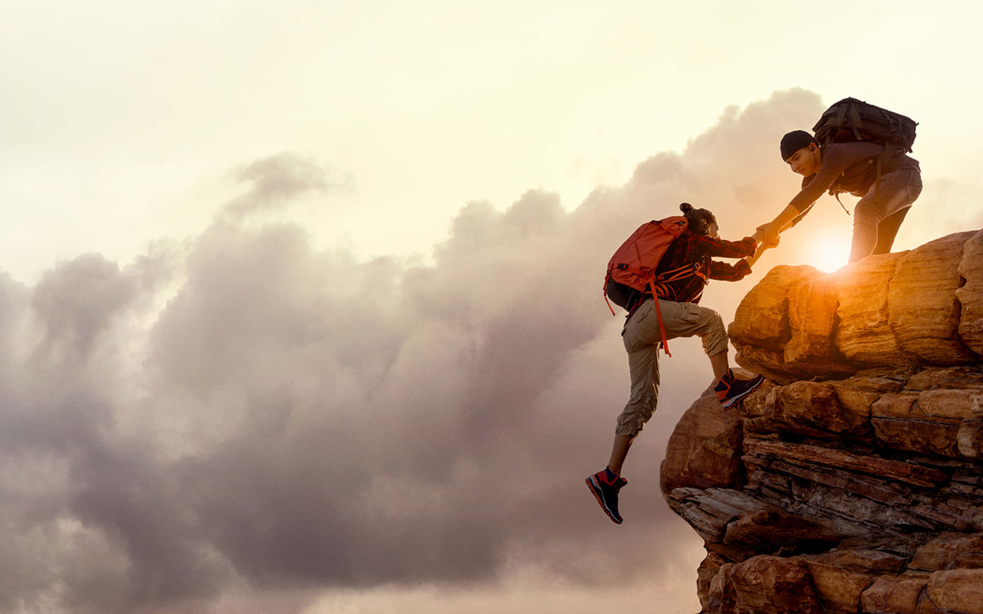Resilient Couple Climbing Mountain Background