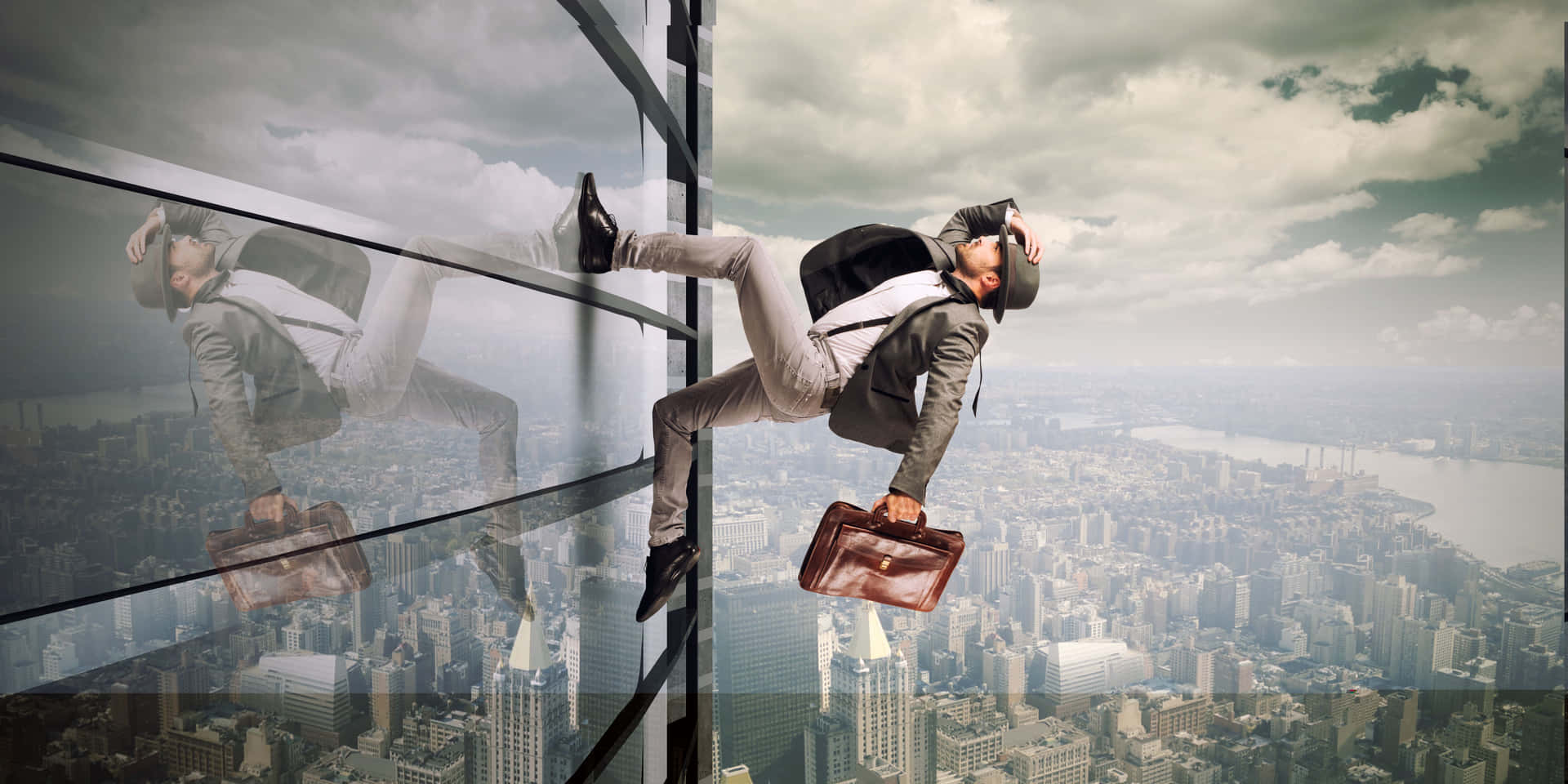Resilient Man I Suit And Tie Soaring Above A Building Background