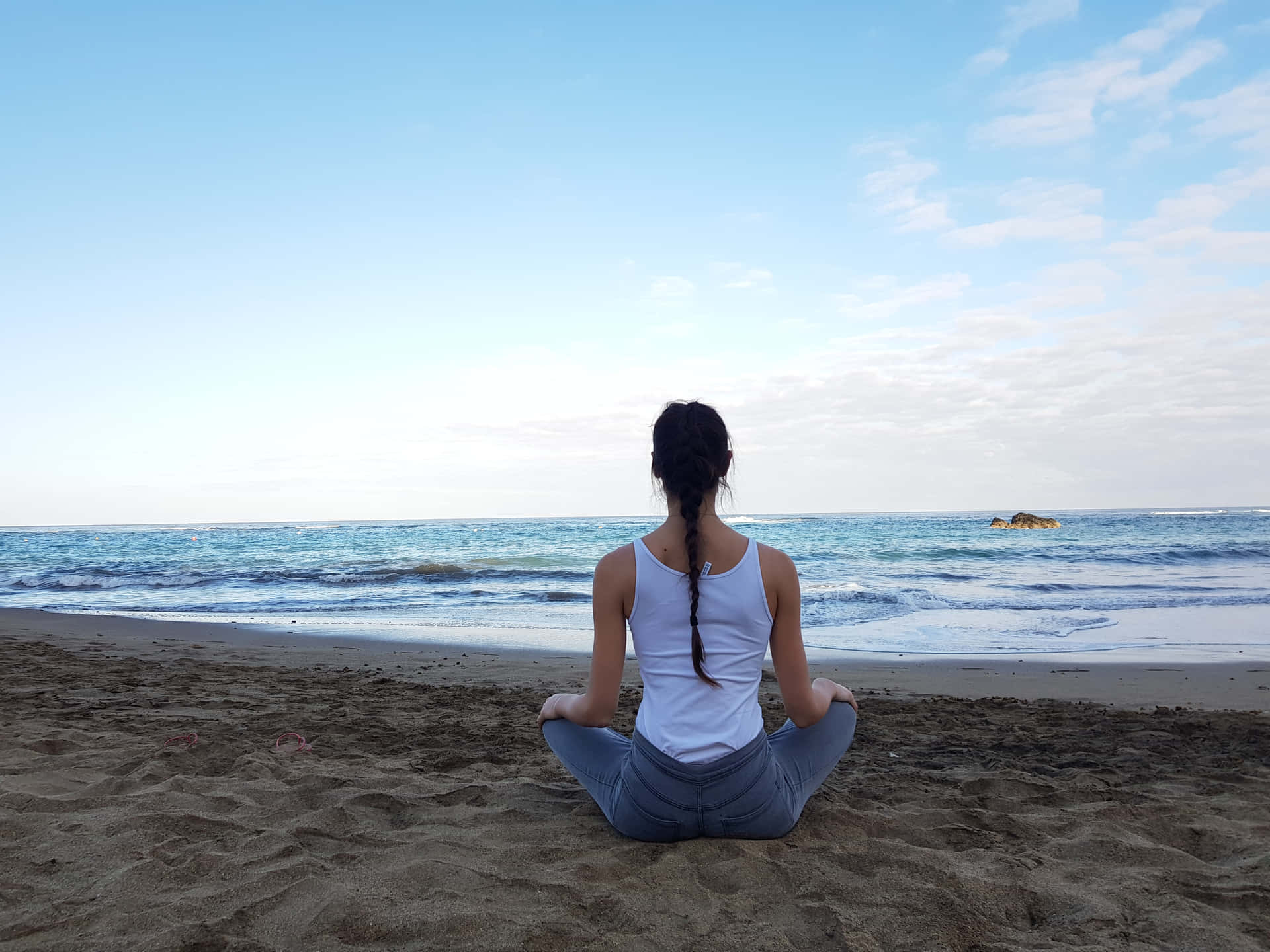 Resilient Woman Sitting Alone Beside The Beach Background