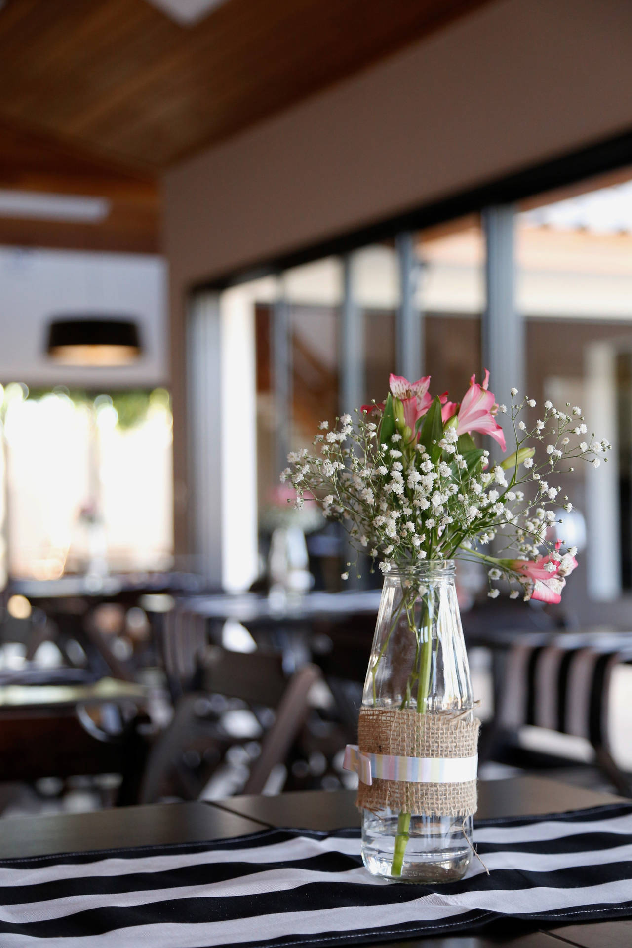 Restaurant Flowers In Flower Vase Background