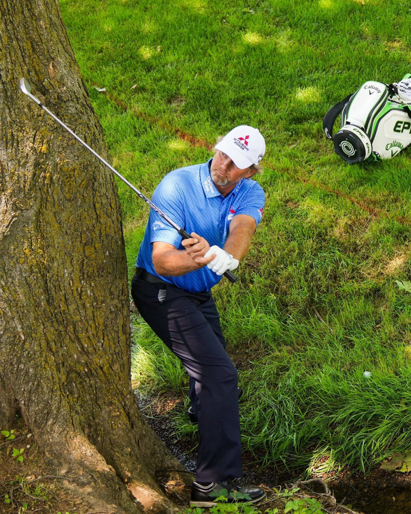 Retief Goosen Dislodging His Golf Club