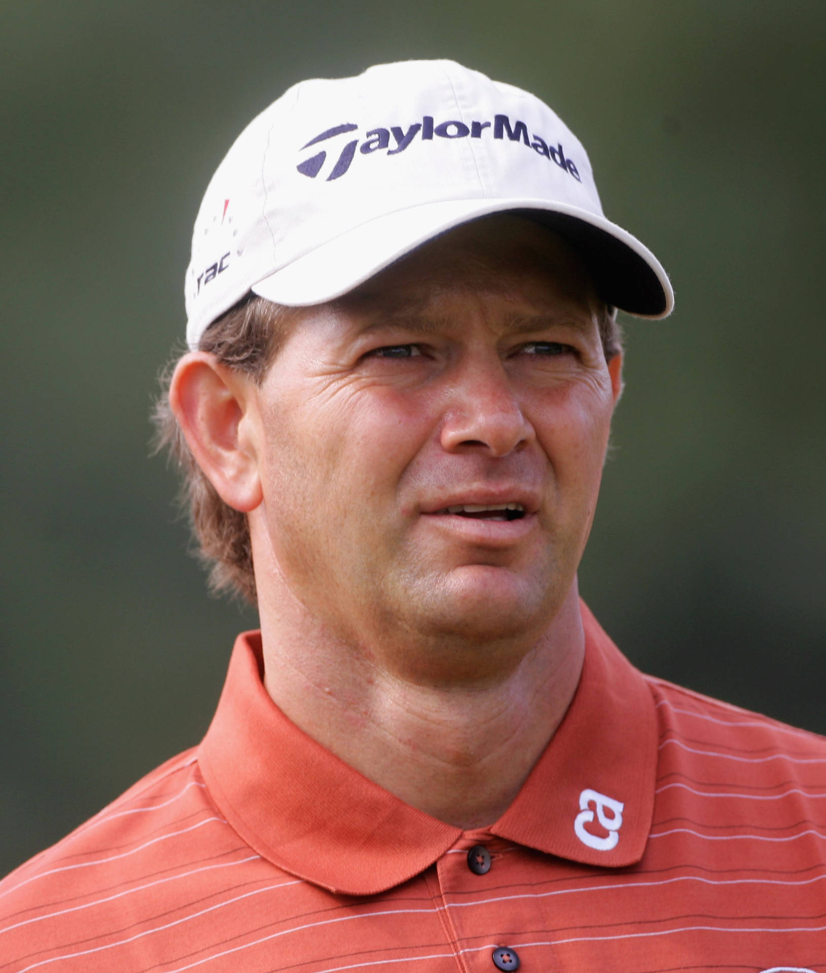 Retief Goosen Wearing A Taylormade White Hat During A Golf Tournament