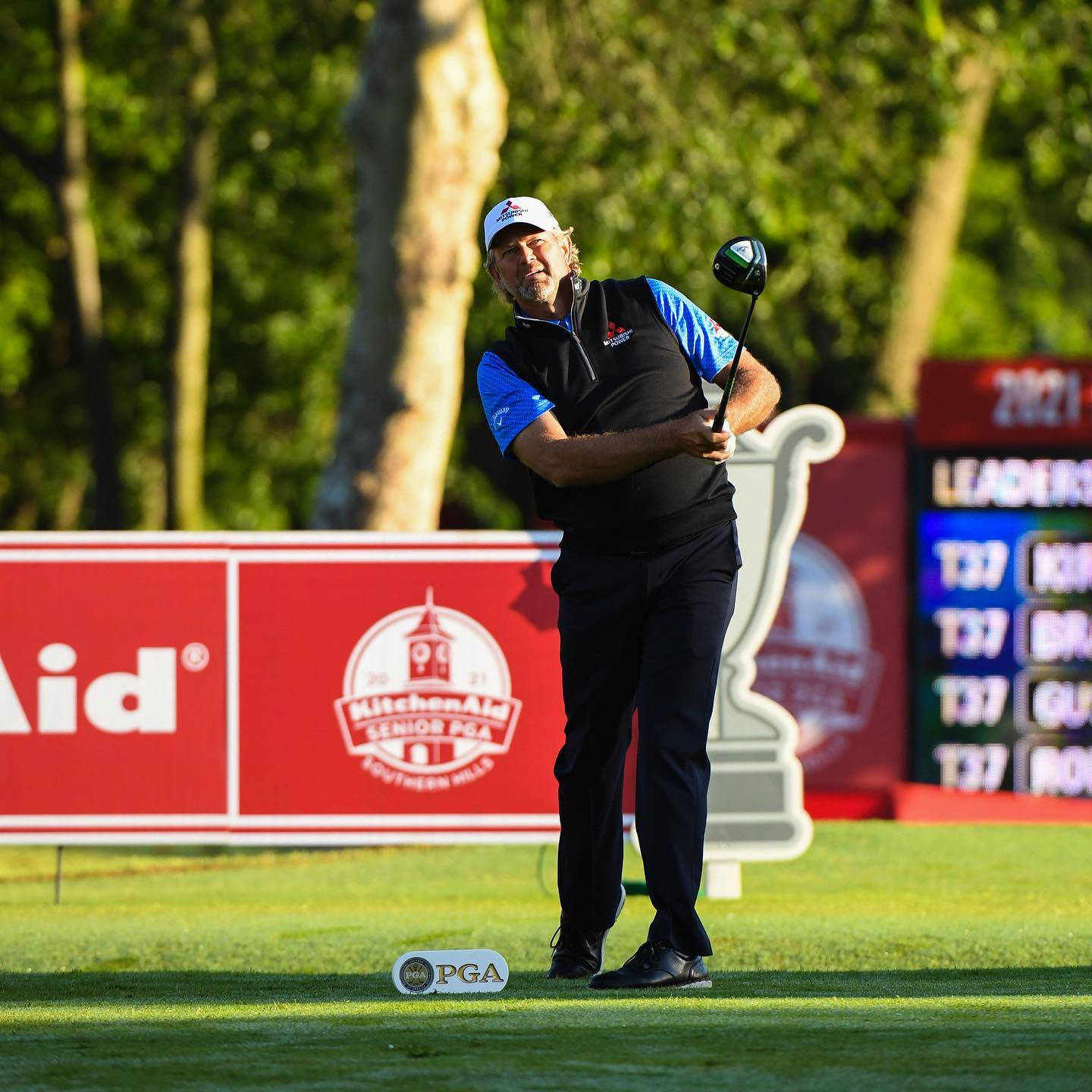 Retief Goosen Wearing A Vest Background