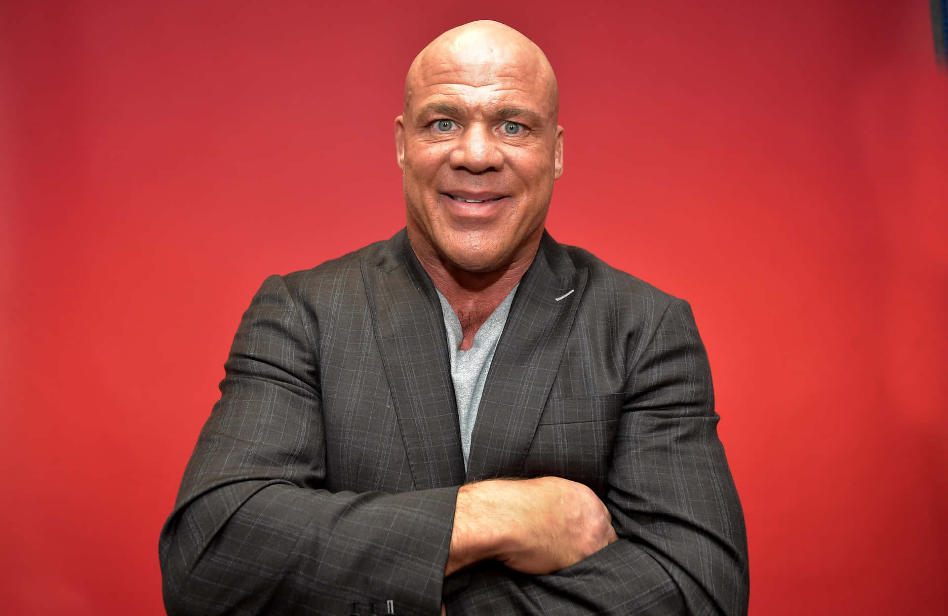 Retired Professional Wrestler Kurt Angle Folded Hands Background