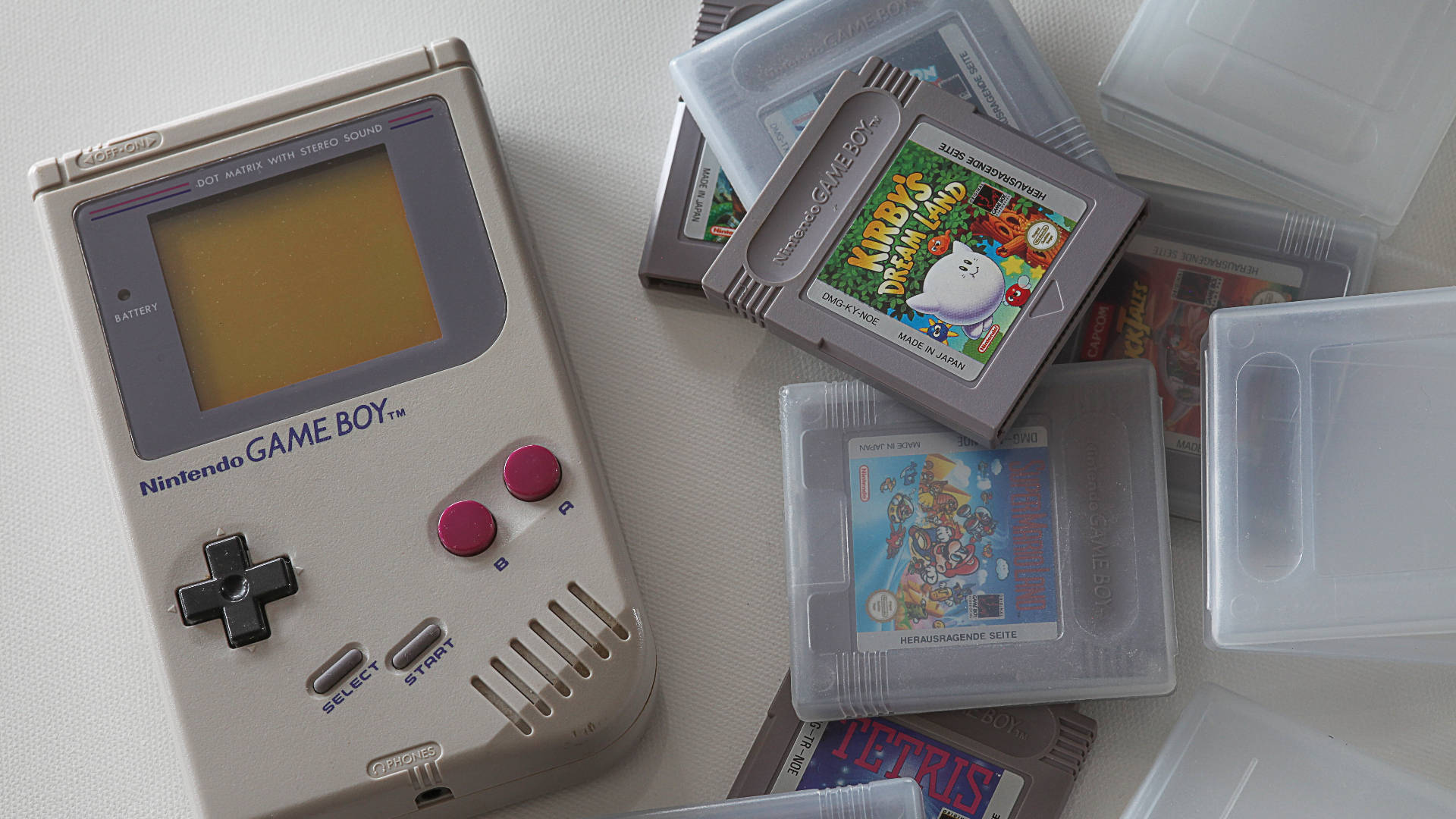Retro Game Boy With Cartridges Collection