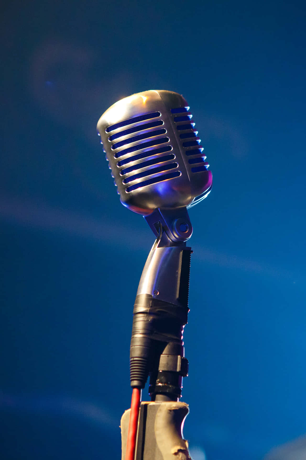 Retro Microphone On Stage Background