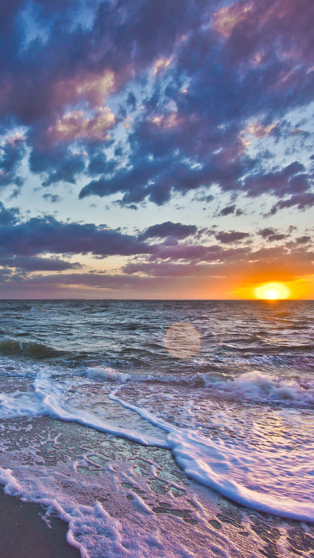 Revel In Tranquility With The Peaceful Blue Hues Of An Ocean Aesthetic Phone. Background