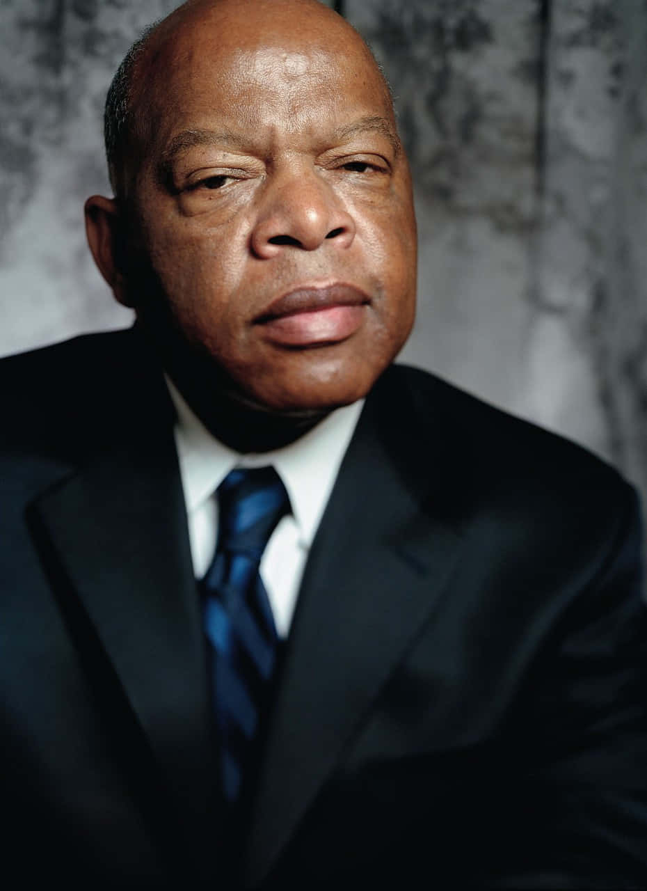 Revered Activist, John Lewis, Against A Gray Background