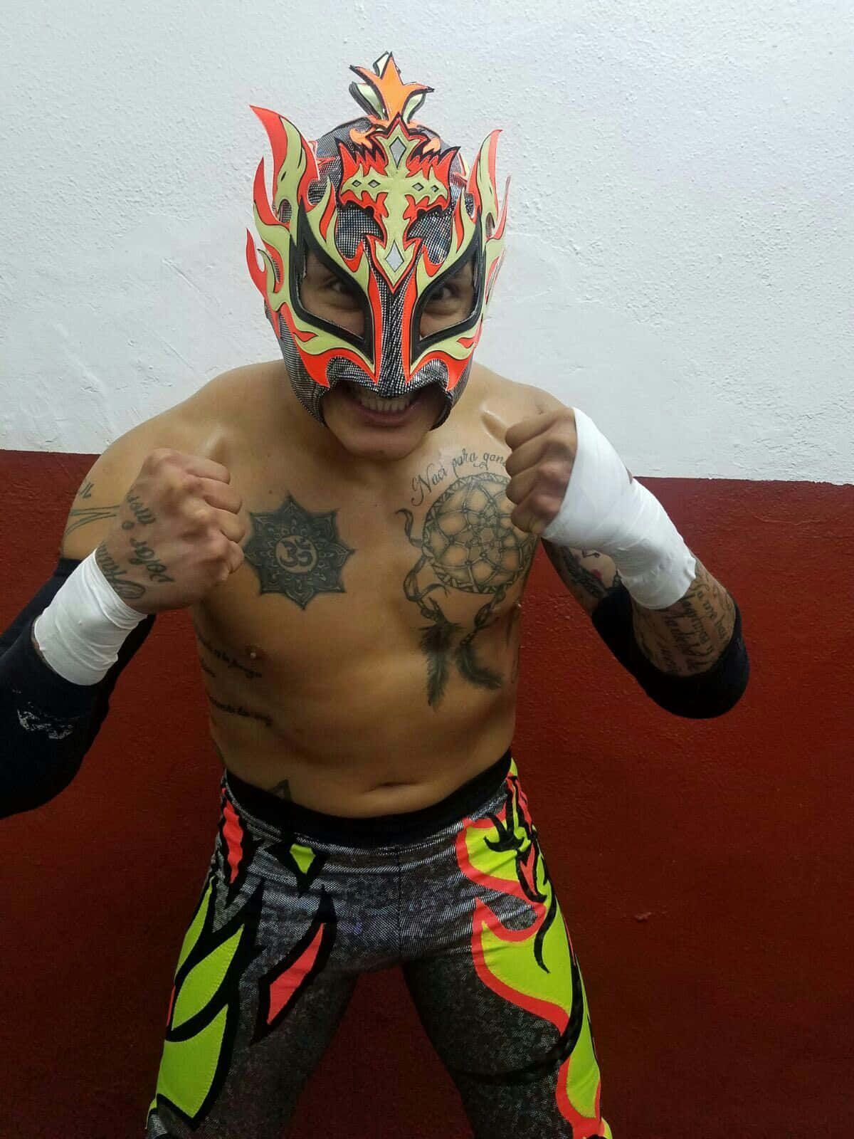 Rey Fenix Professional Wrestler Posing At The Camera Background