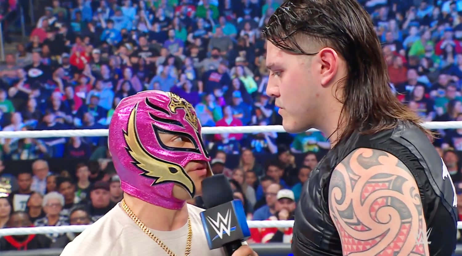 Rey Mysterio Confrontation In W W E Ring Background