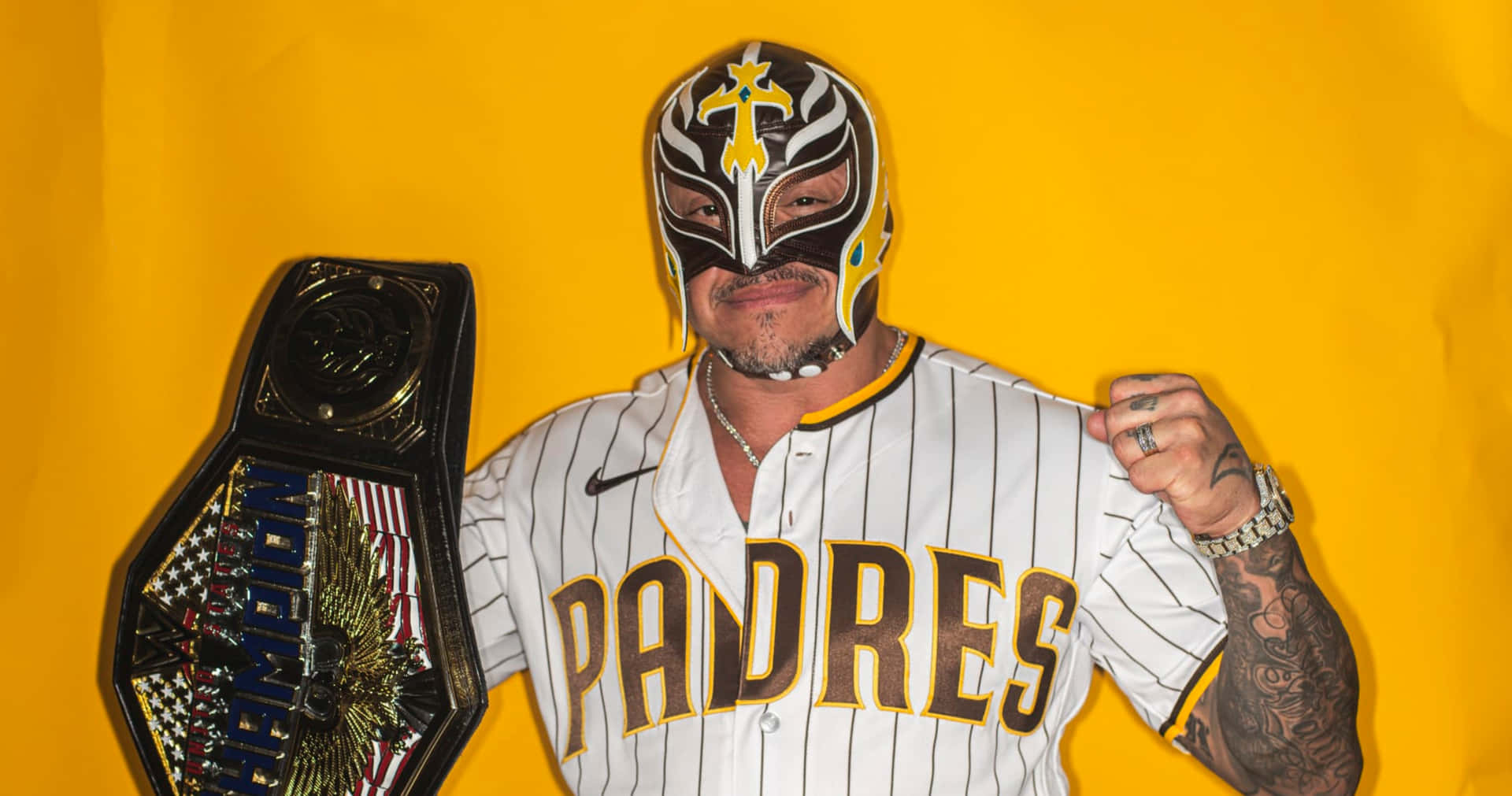 Rey_ Mysterio_with_ Championship_ Belt Background
