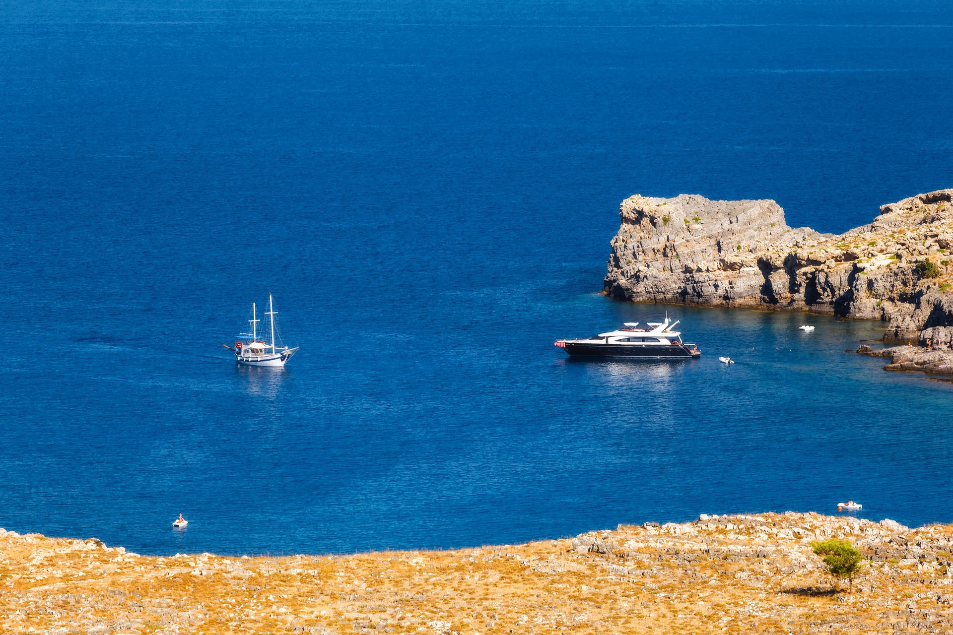 Rhodes Boats Off Coast Background