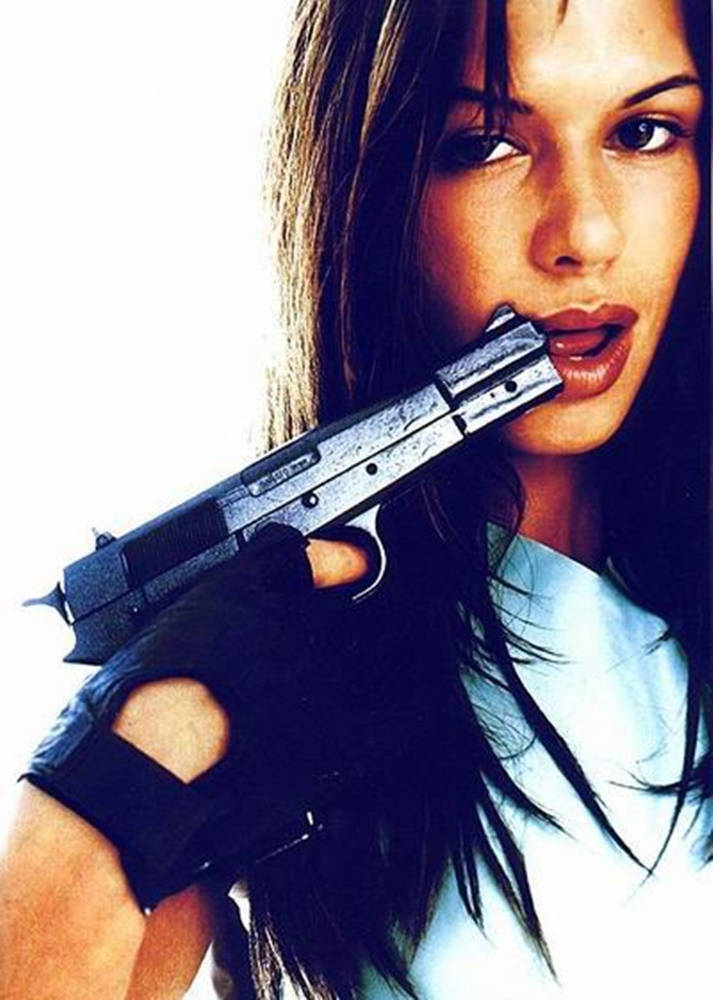 Rhona Mitra With Gun Background