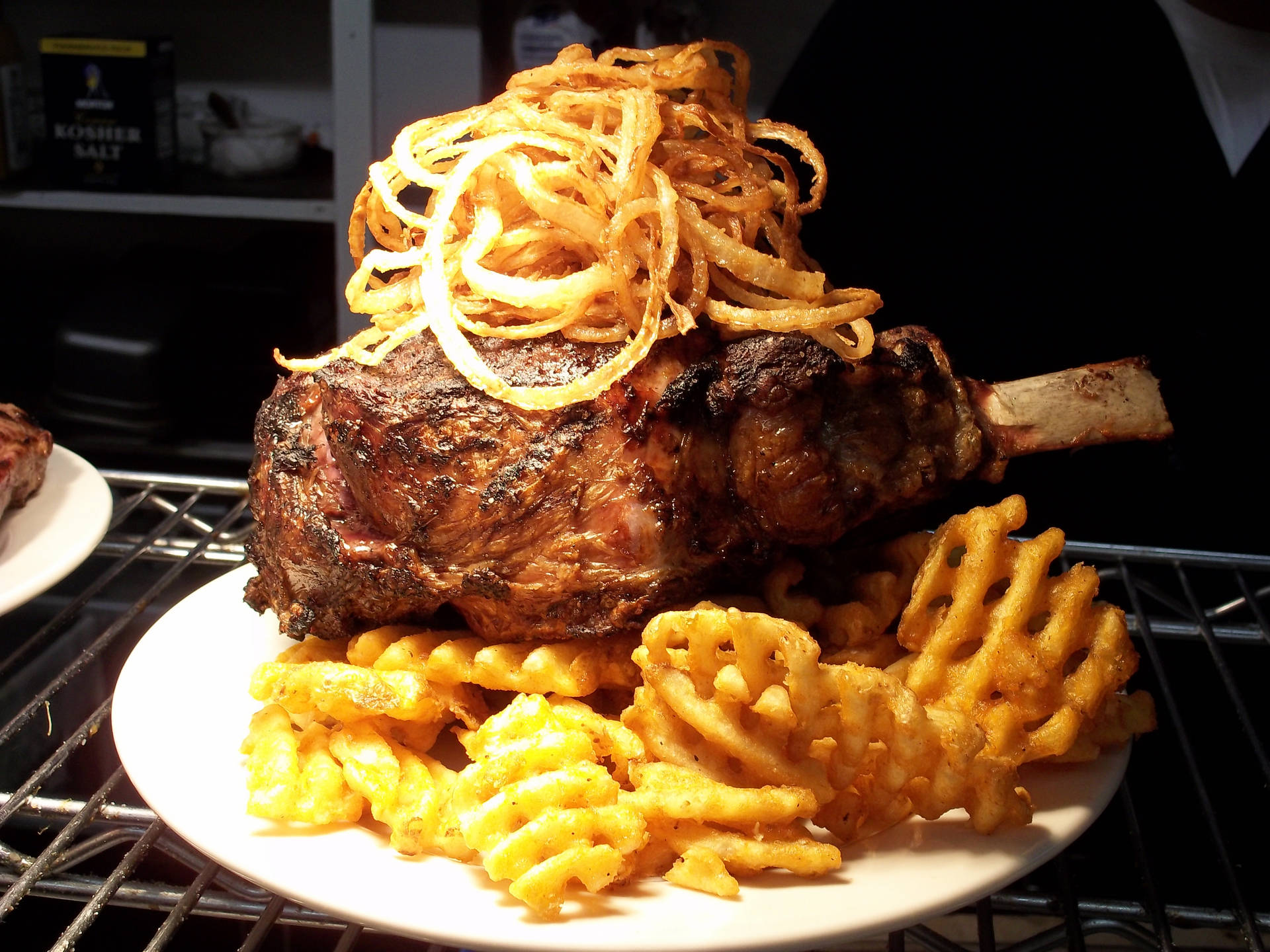 Rib Eye Meat With Onion Rings And Fries