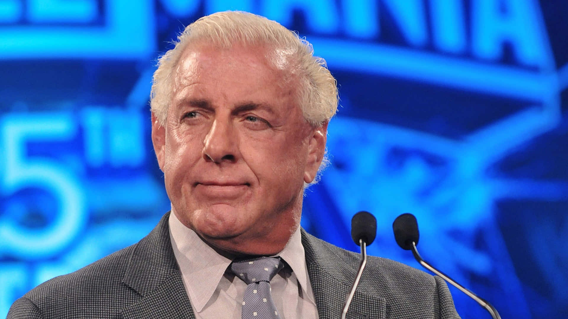 Ric Flair, The Stylin', Profilin', Limousine Riding, Jet Flying, Kiss-stealing, Wheelin' N' Dealin' Son Of A Gun, In Action At Wrestlemania 25th Anniversary. Background
