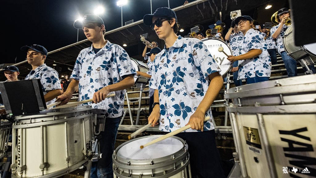 Rice University Marching Band Exciting Performance Background