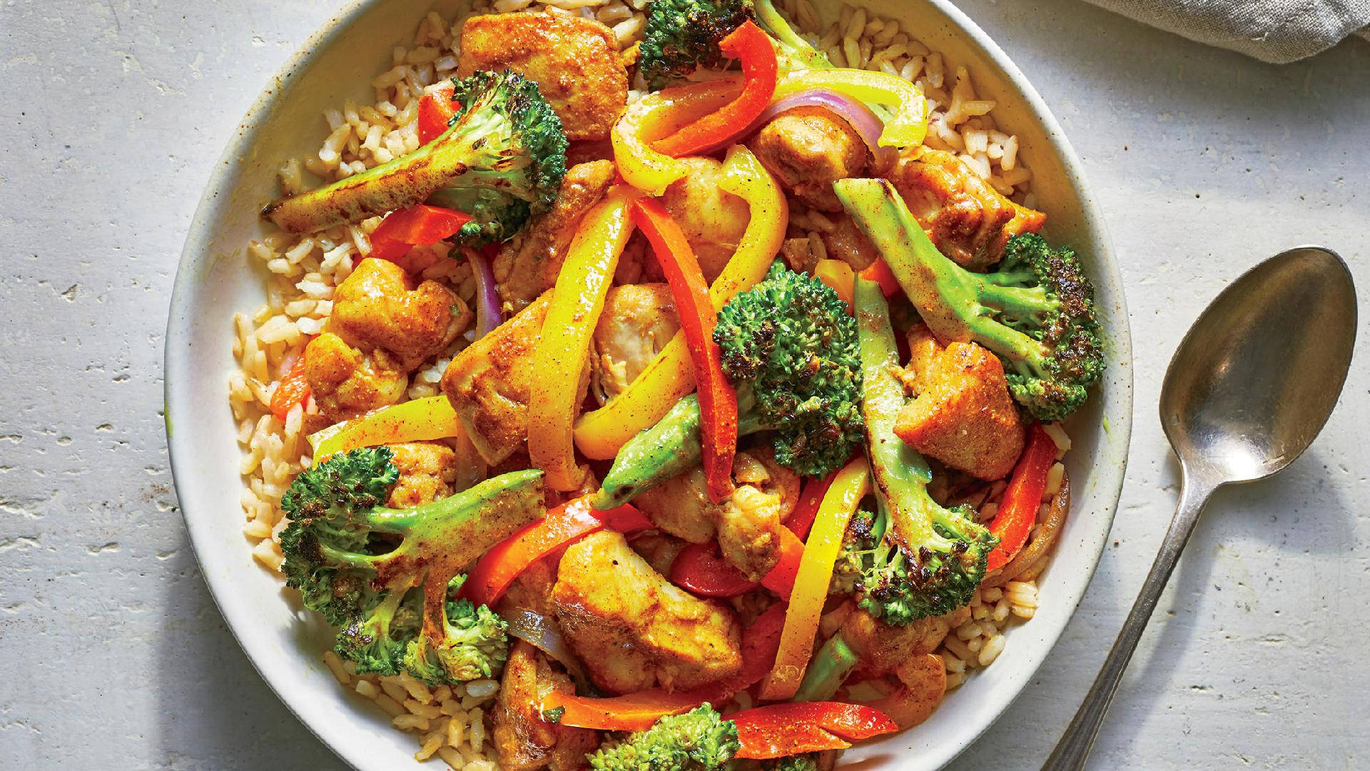 Rice With Yellow Curry And Broccoli Background