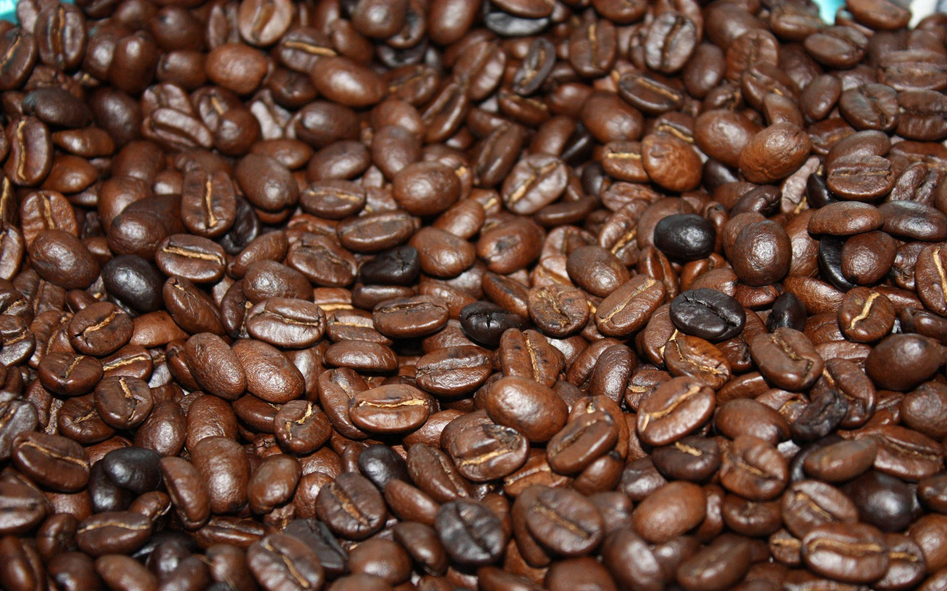 Rich And Flavorful Roasted Coffee Beans Background