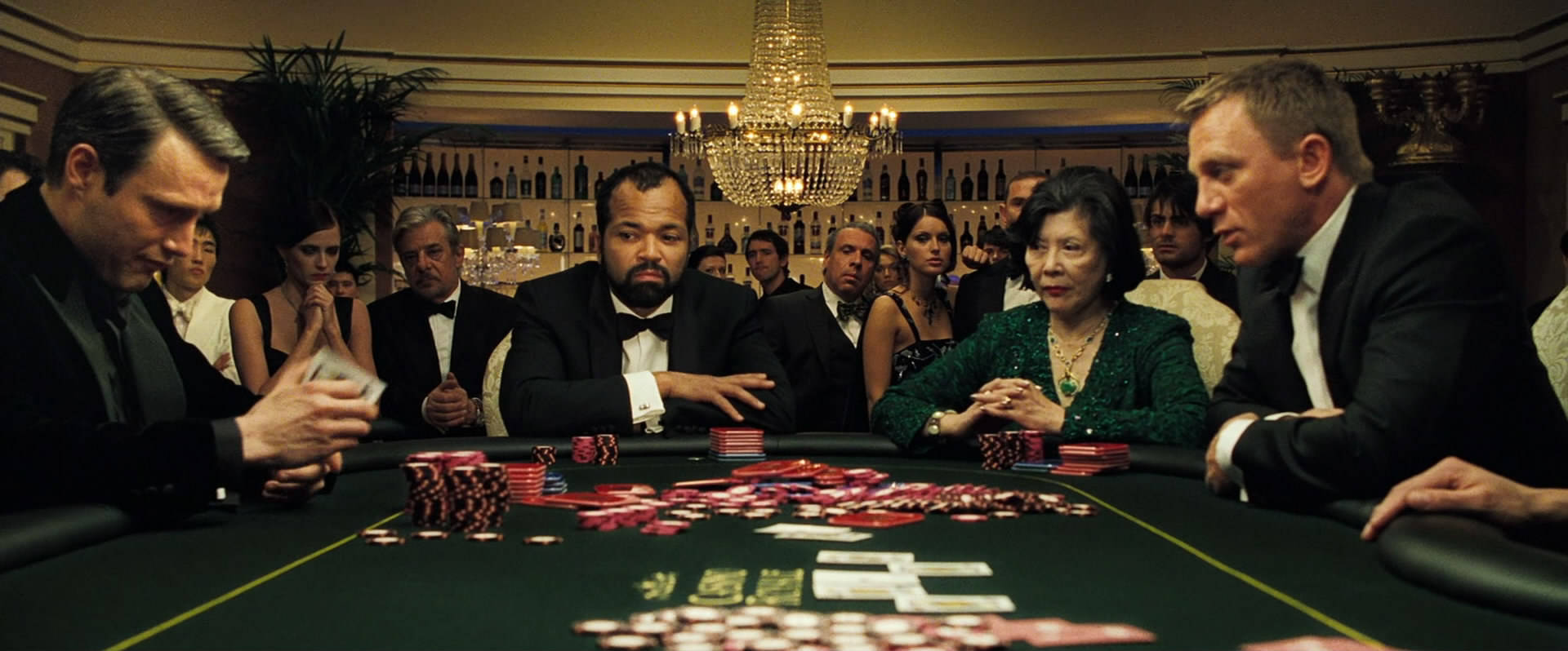 Rich People Playing On Poker Table Background