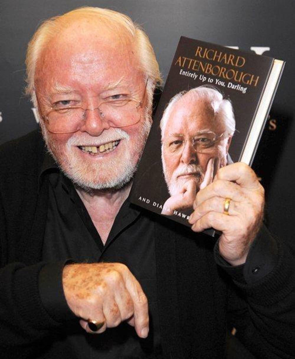 Richard Attenborough Holding Book Background