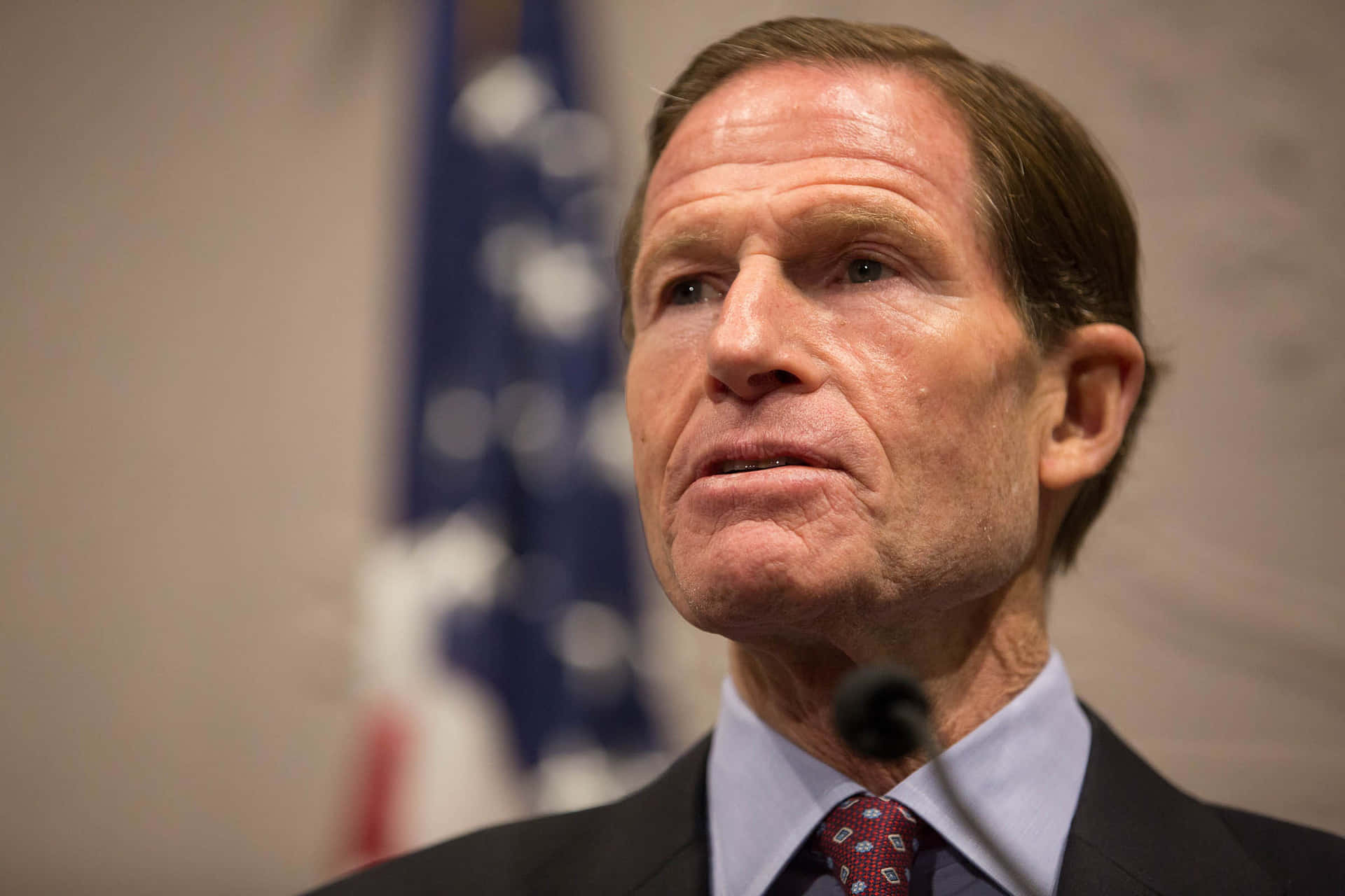 Richard Blumenthal In Front Of The American Flag