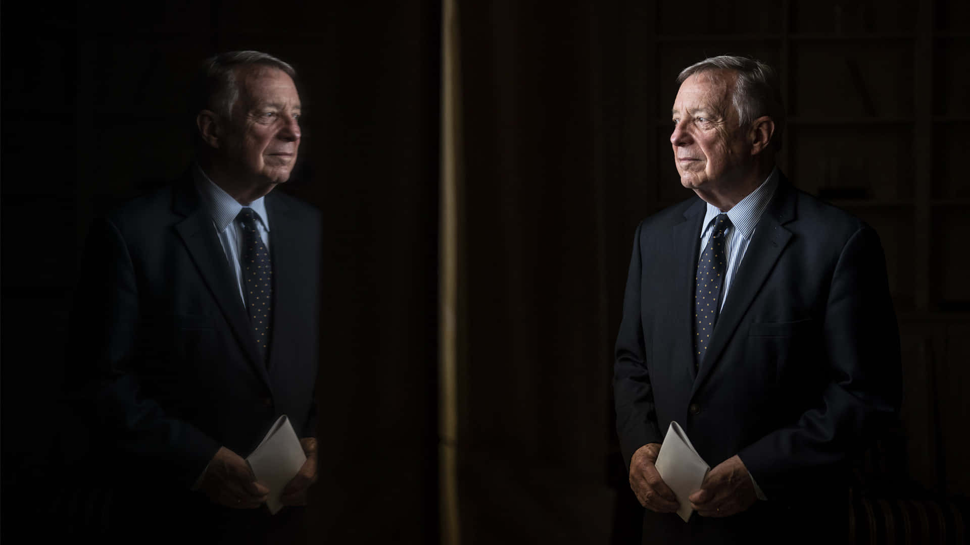 Richard Durbin Looking At His Reflection Background
