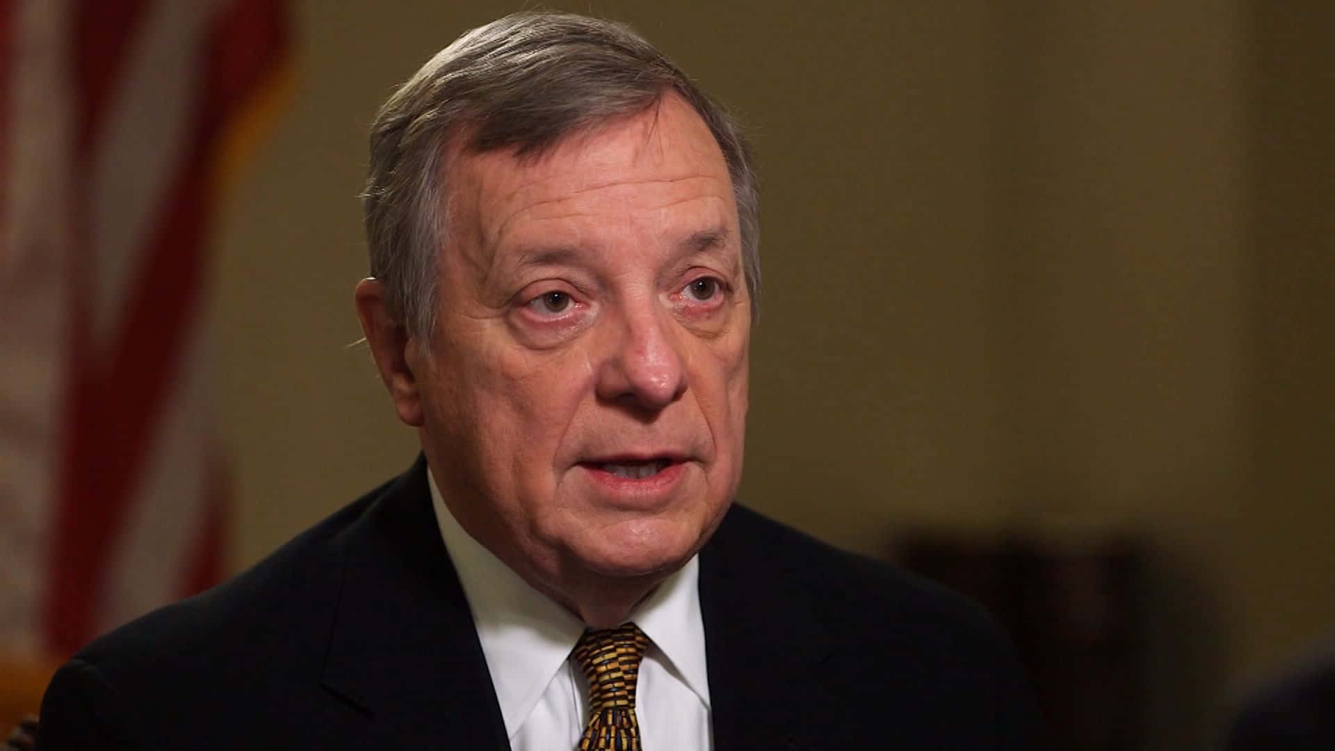Richard Durbin Neutral Expression Up Close Background