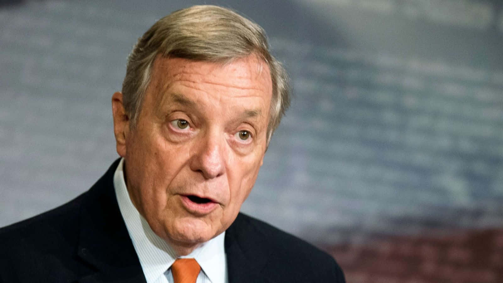 Richard Durbin Photographed While Speaking Background