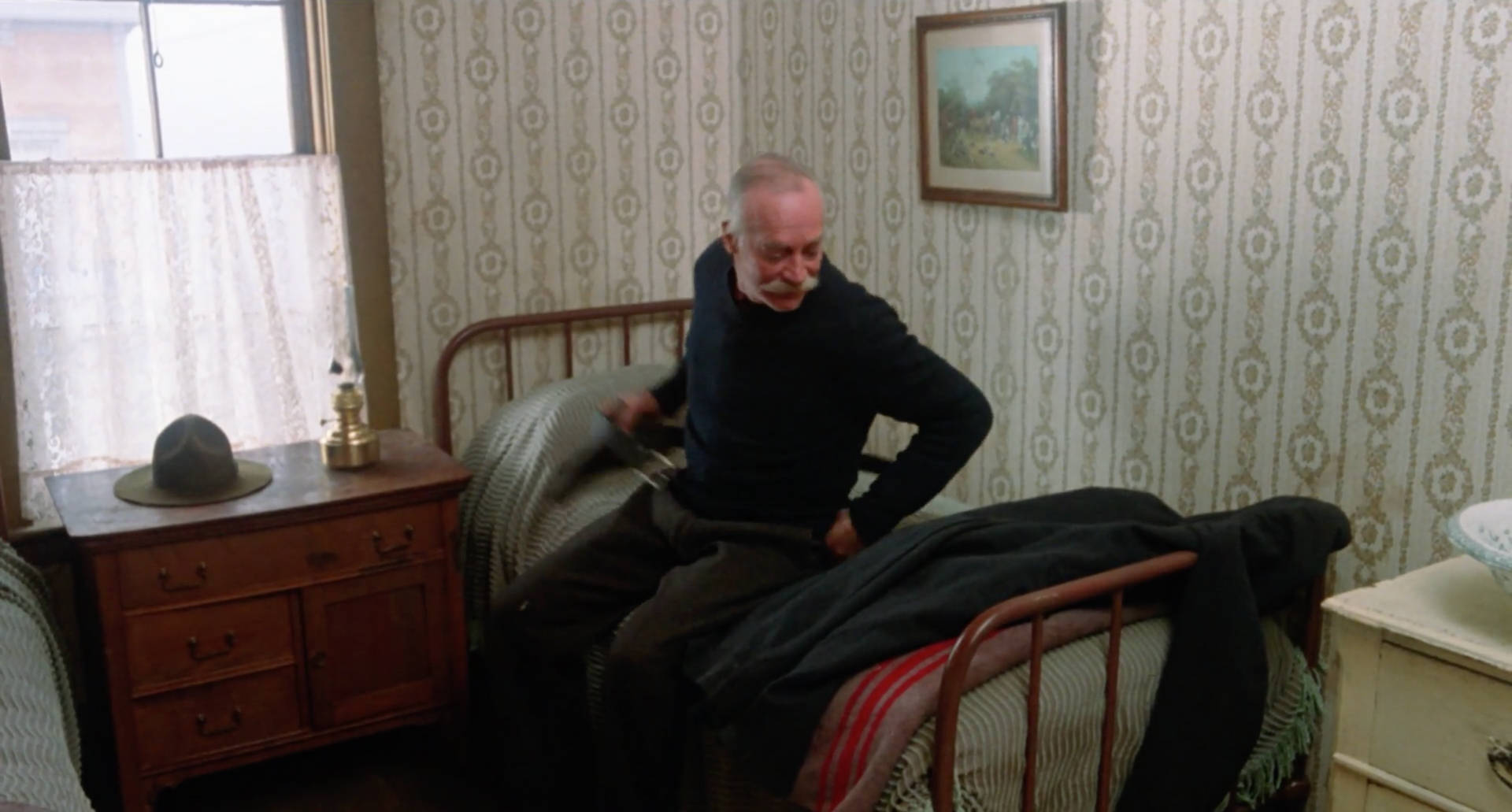 Richard Farnsworth On Hotel Bed Background