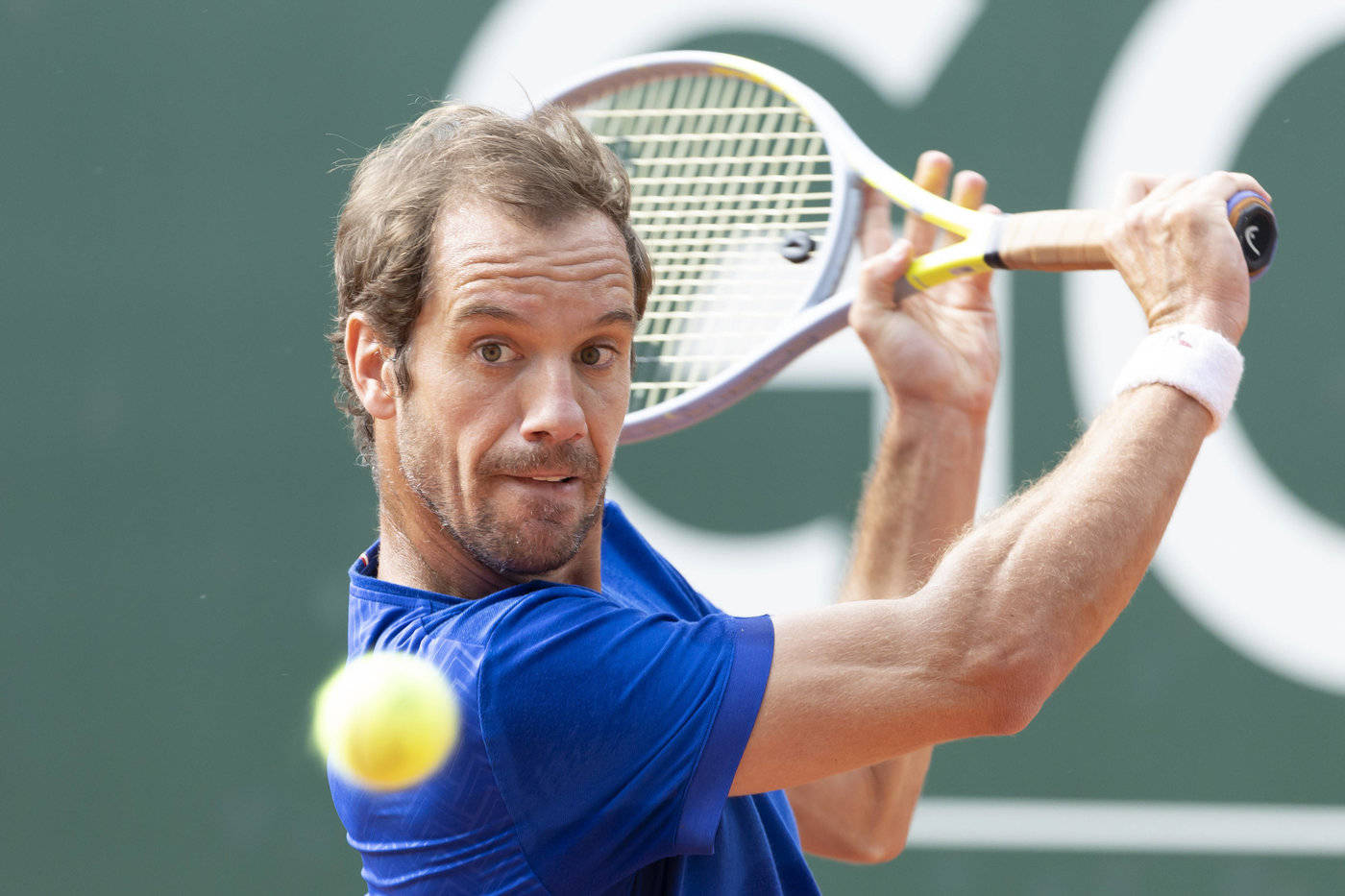 Richard Gasquet Aiming To Hit Ball Background