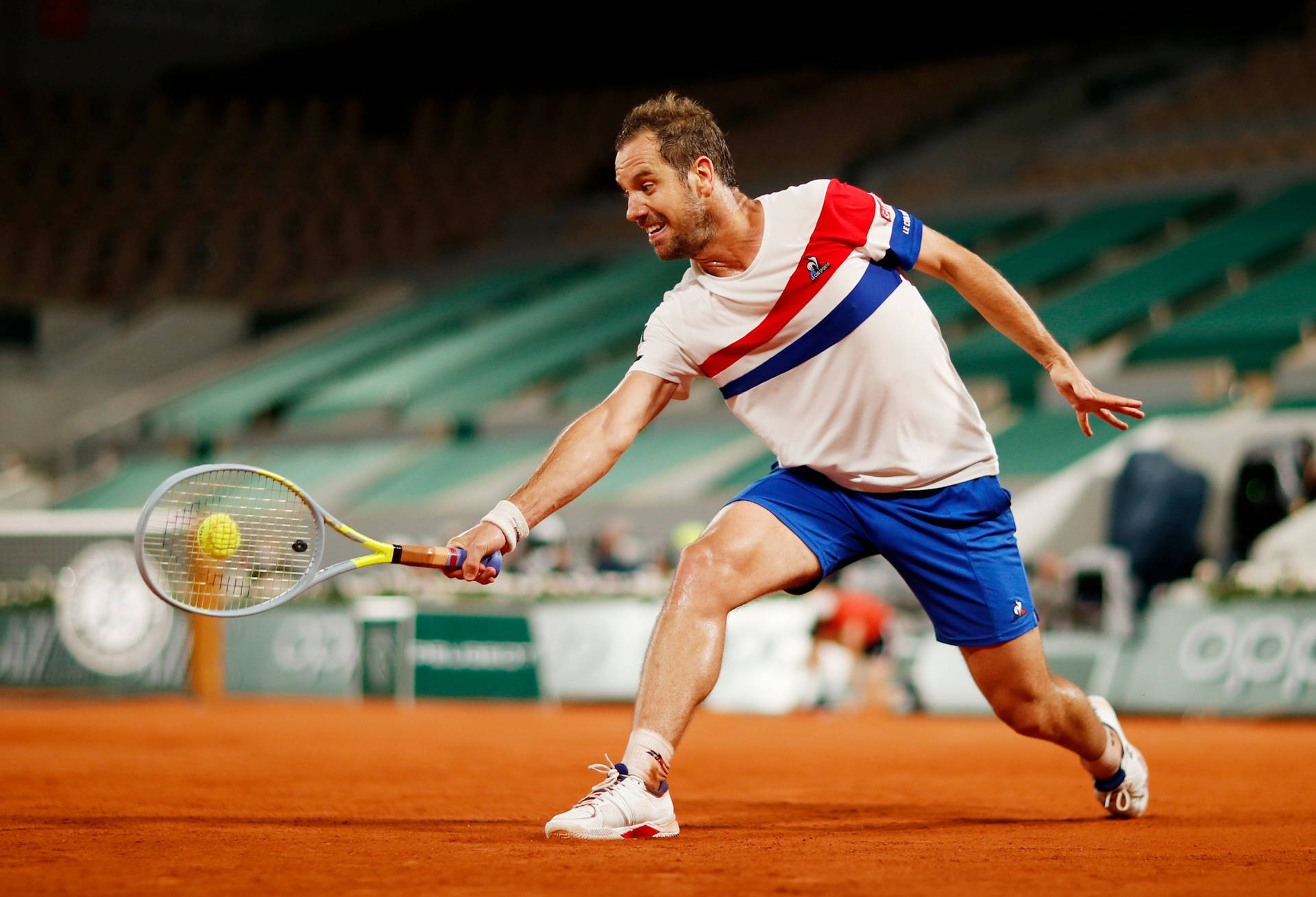 Richard Gasquet Bending To Reach Ball