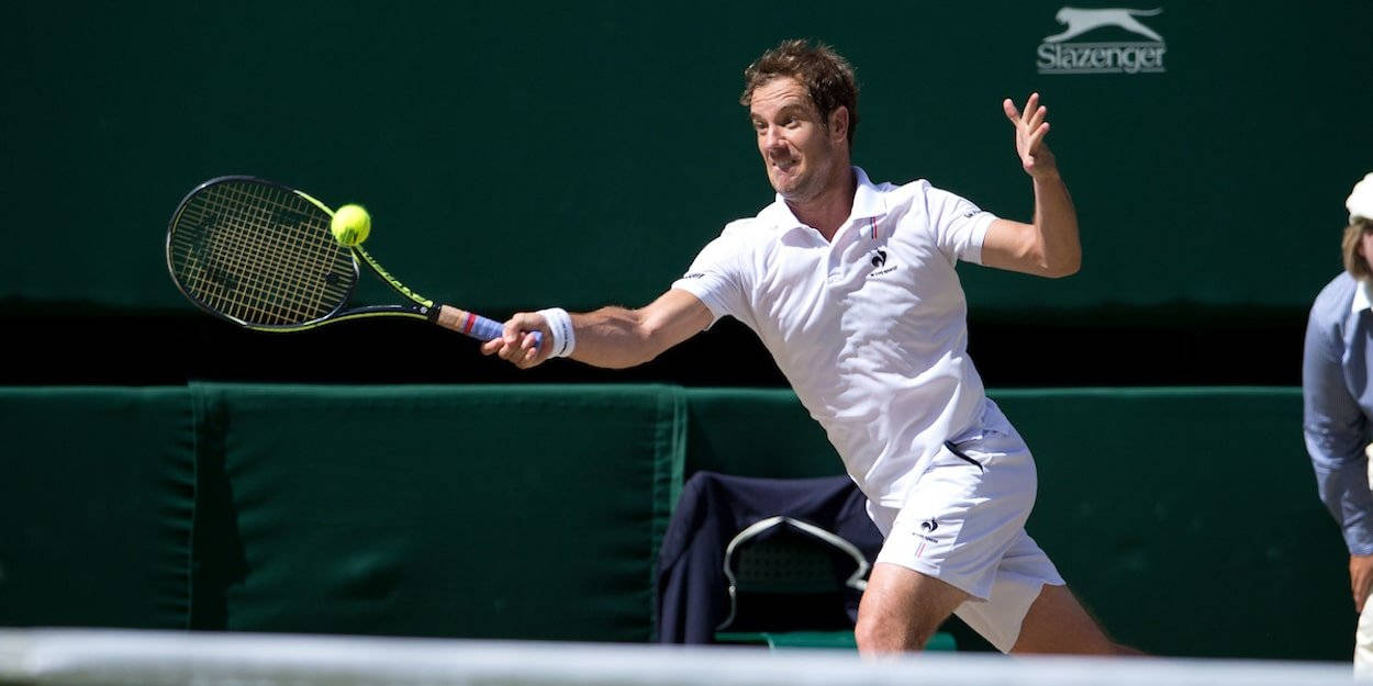 Richard Gasquet Making A Dynamic Run For The Ball During A Match Background