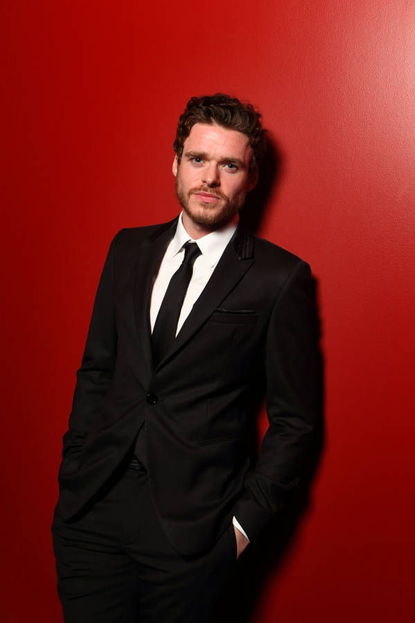 Richard Madden In Black Suit Background