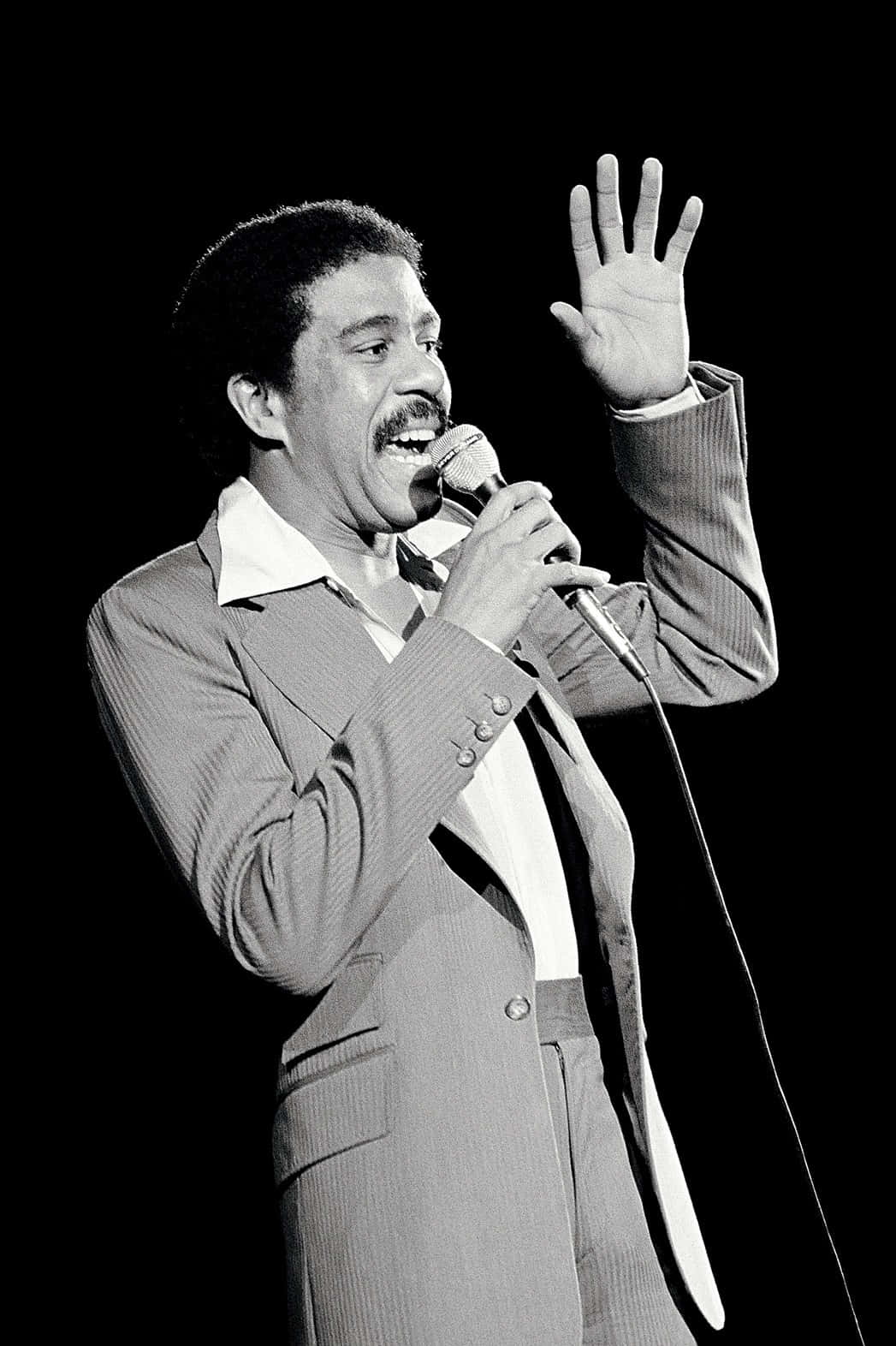 Richard Pryor On Stage - The Light Of Comedy Background