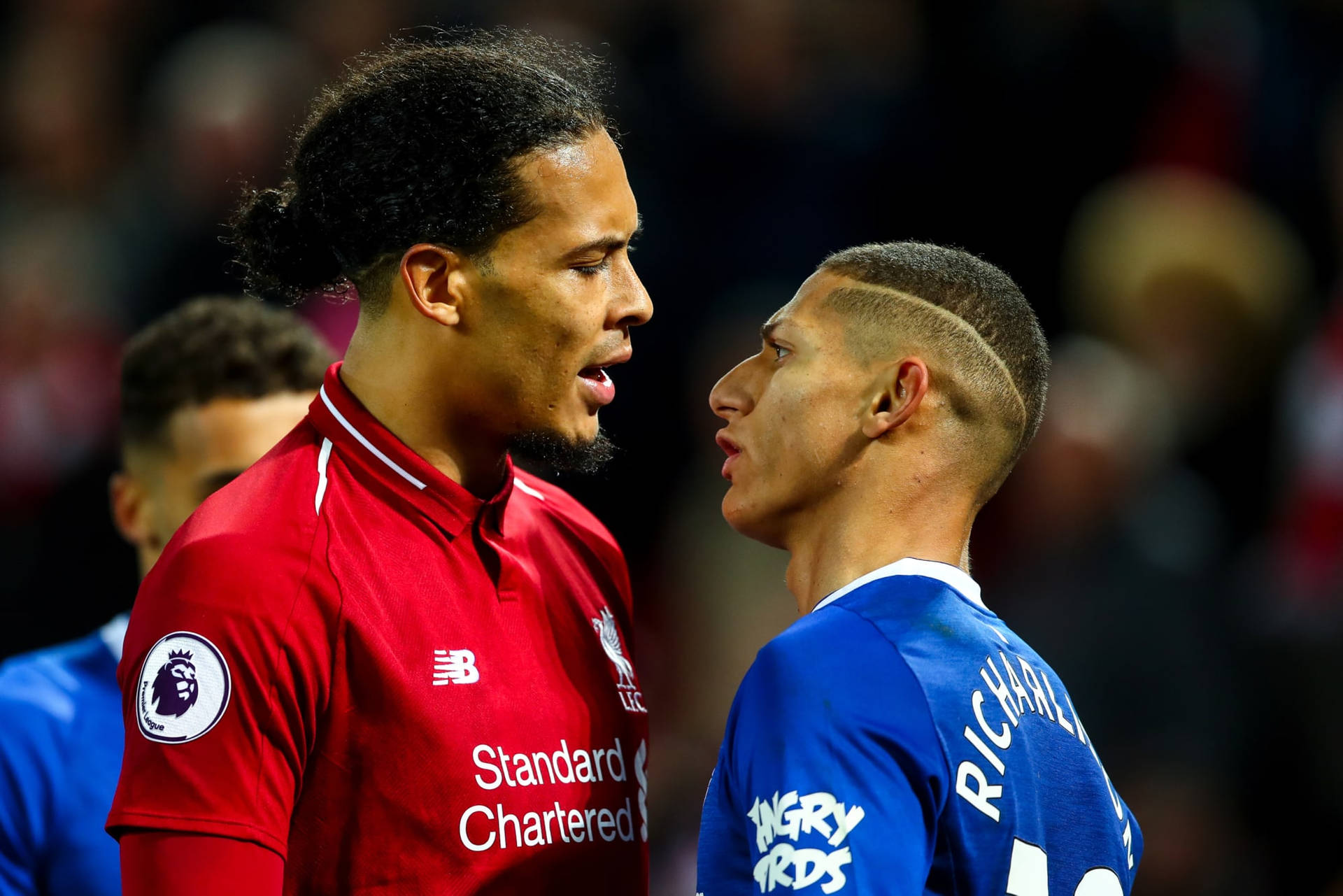 Richarlison De Andrade Confronting An Opponent