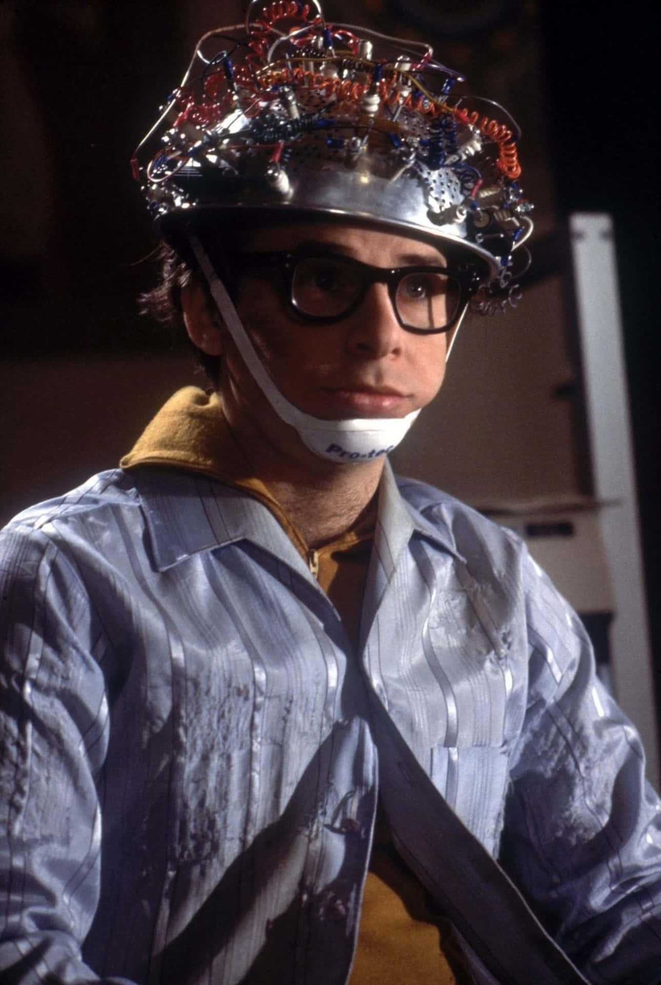 Rick Moranis In A Scene From Ghostbusters Background