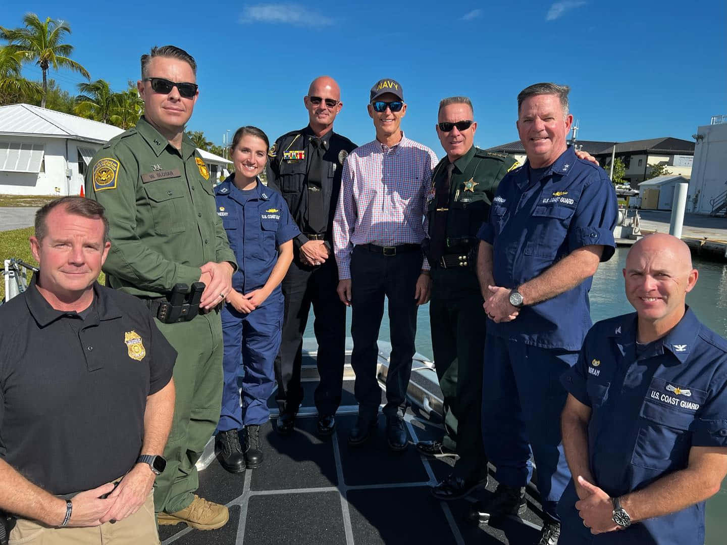 Rick Scott With Various People Background