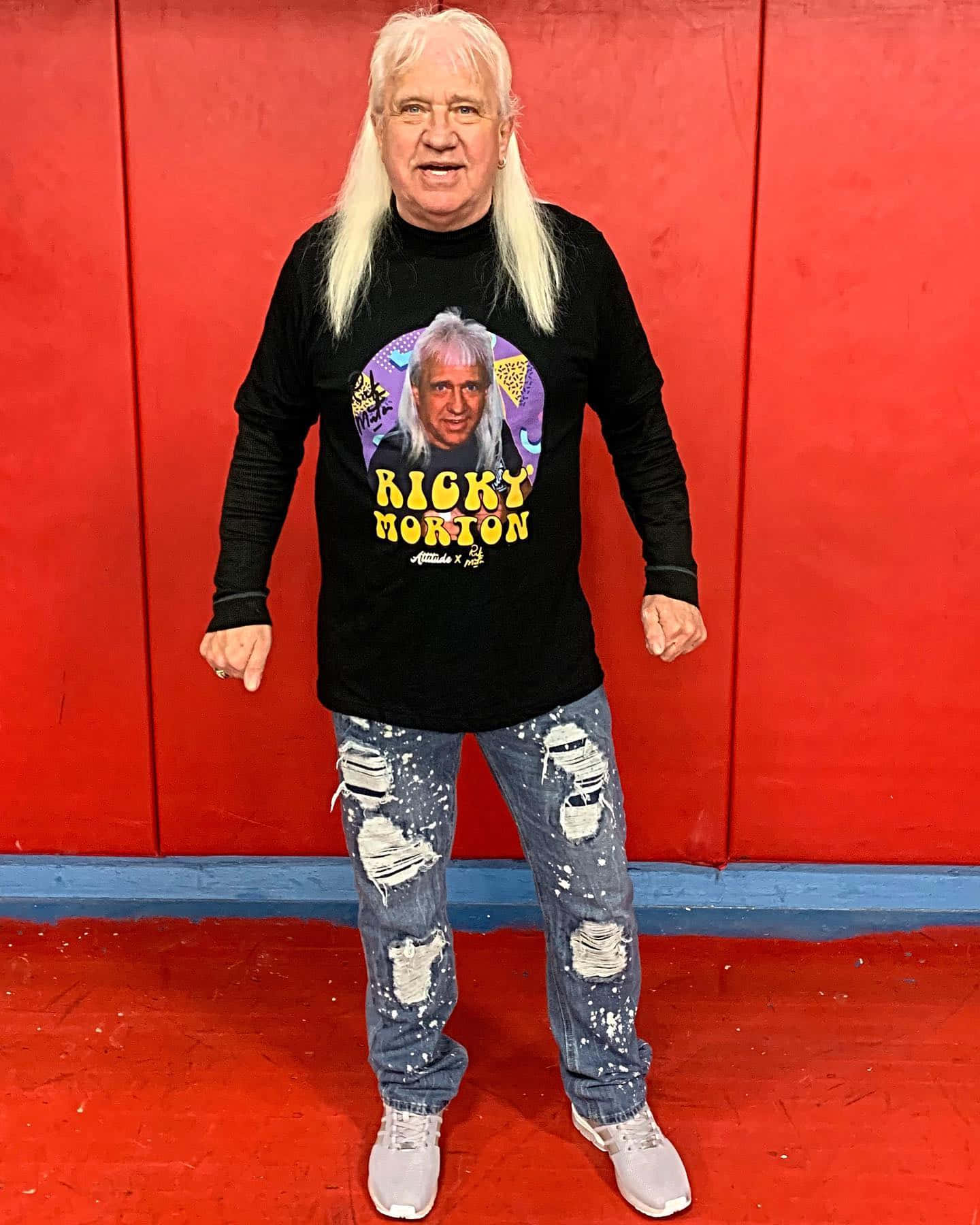 Ricky Morton Wearing Own Merchandise Background