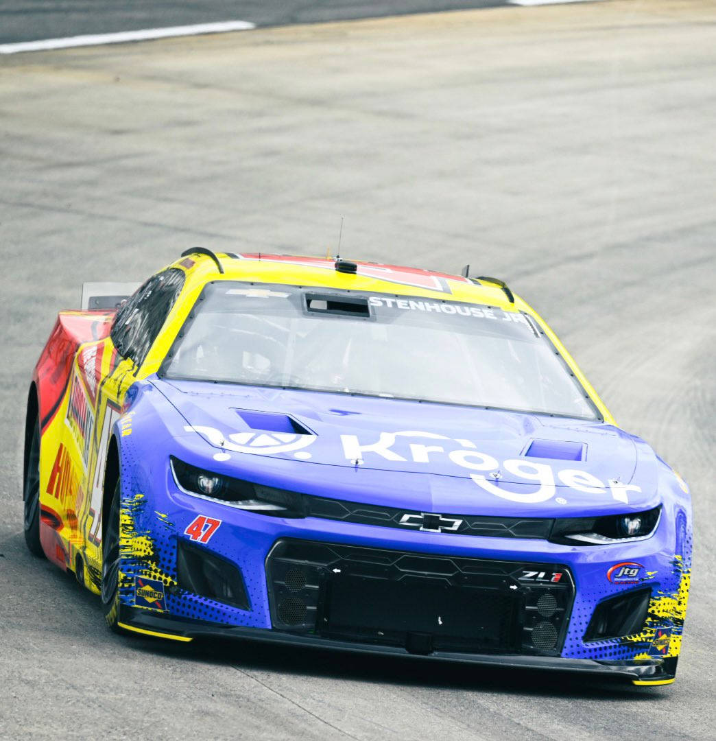 Ricky Stenhouse Jr. In His Vibrant Race Car, Close-up View