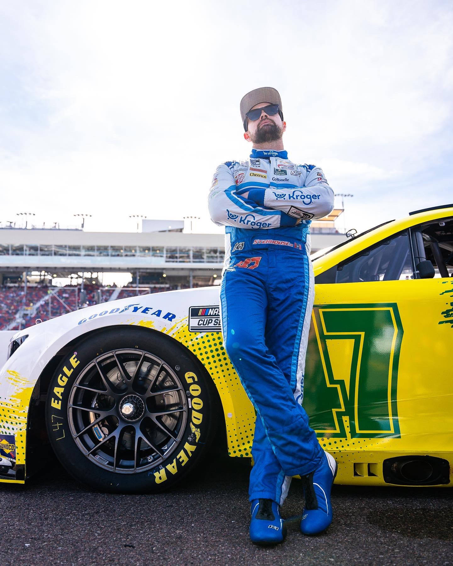 Ricky Stenhouse Jr. Leaning Against Car