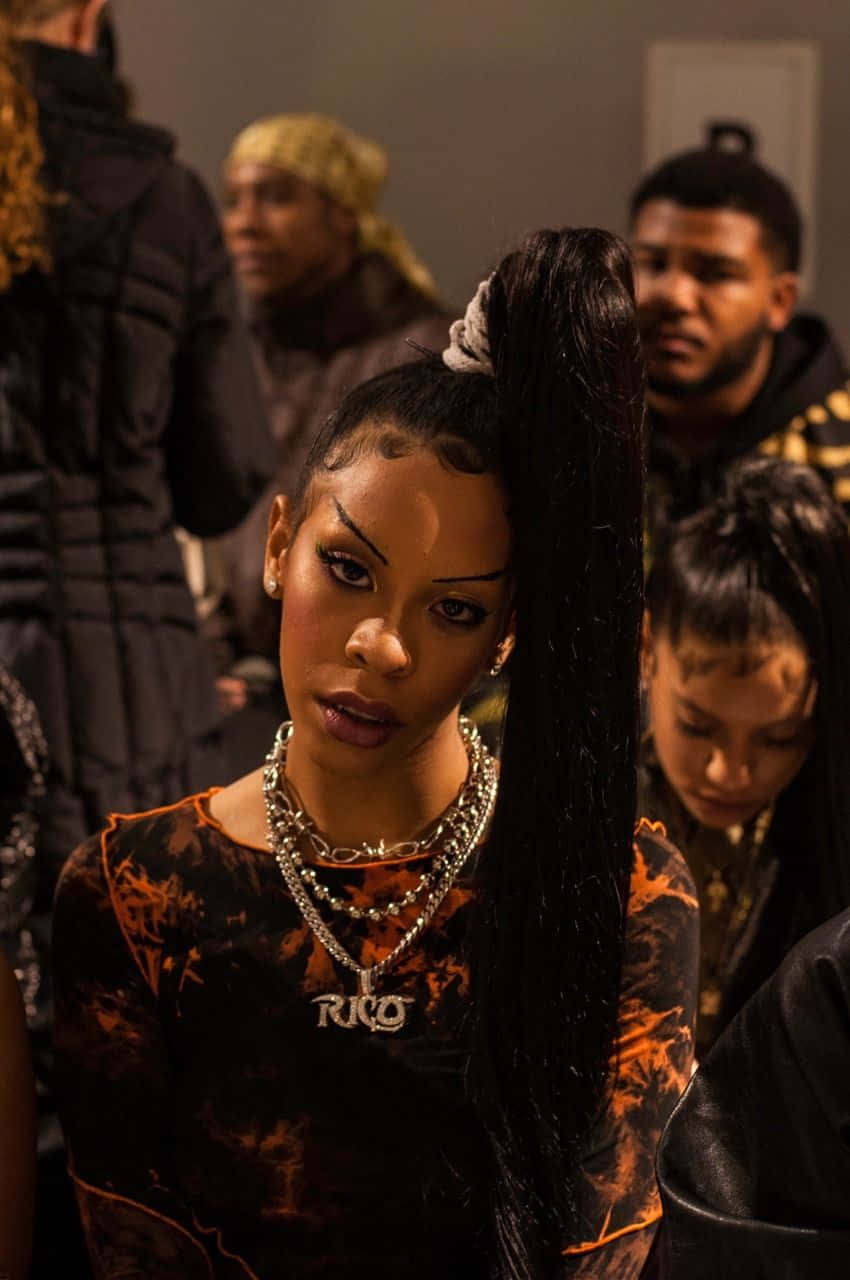 Rico Nasty Performing On Stage Background