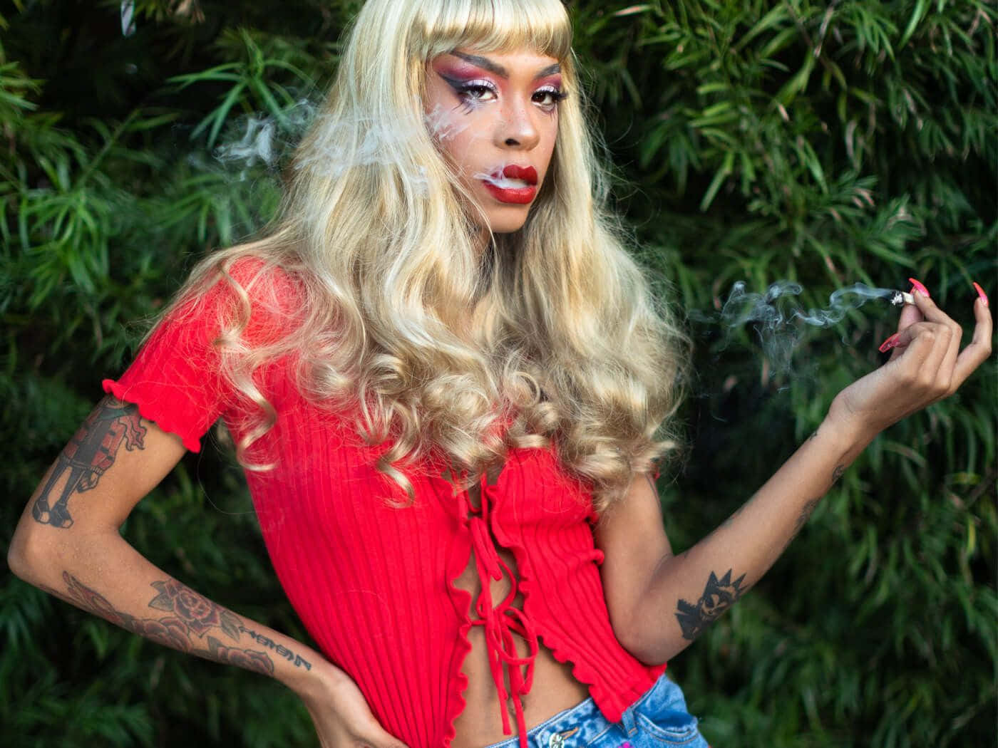 Rico Nasty Seen Wearing A Black Leather Jacket Background