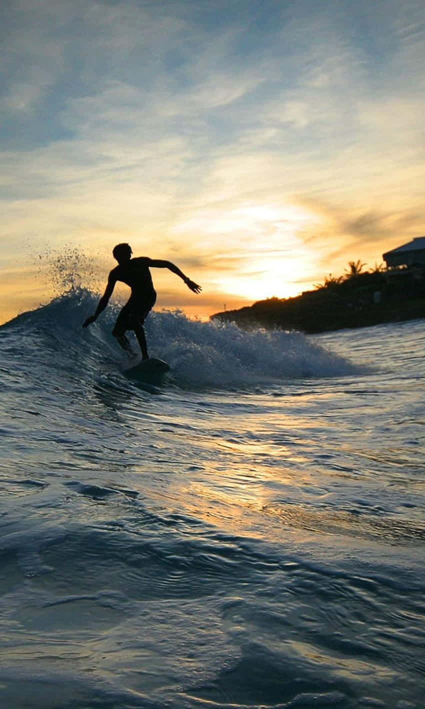 Ride The Waves With This Epic Surfing Iphone Wallpaper Background