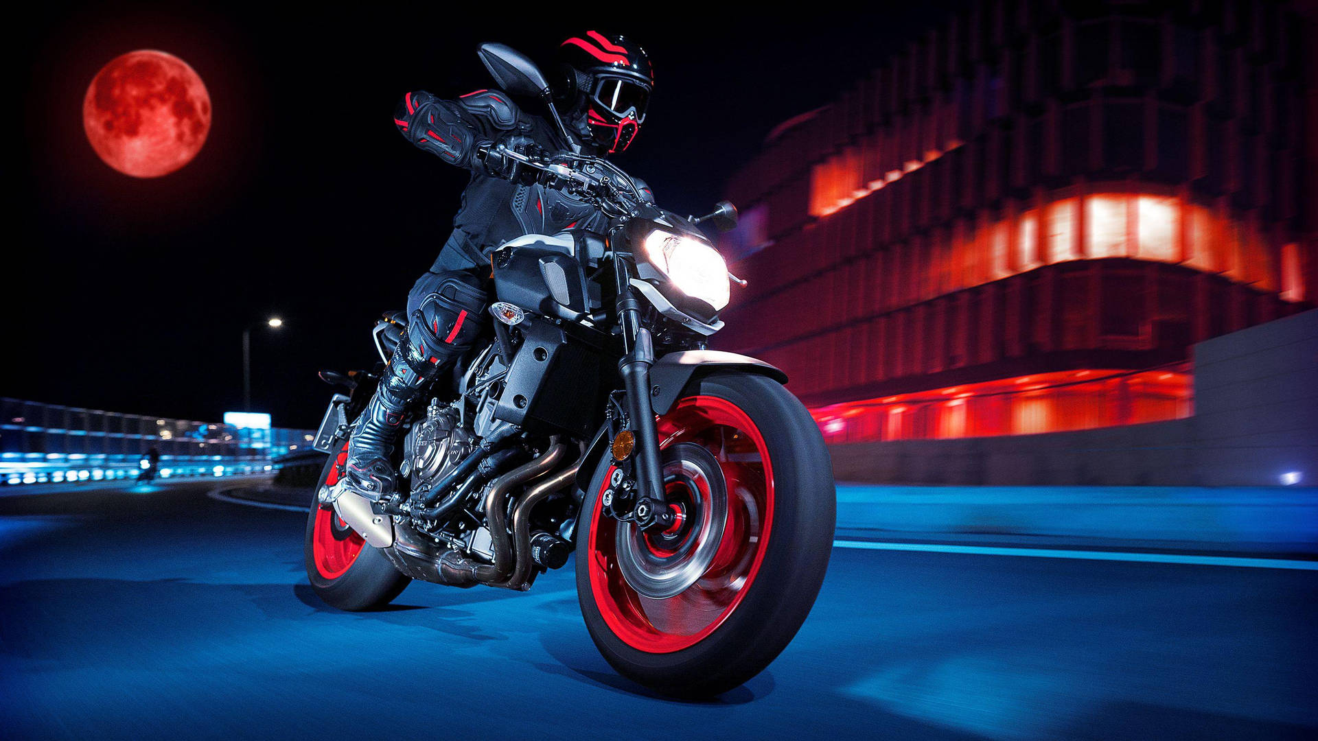 Rider With Black Yamaha Mt 15 Under The Red Moon Background