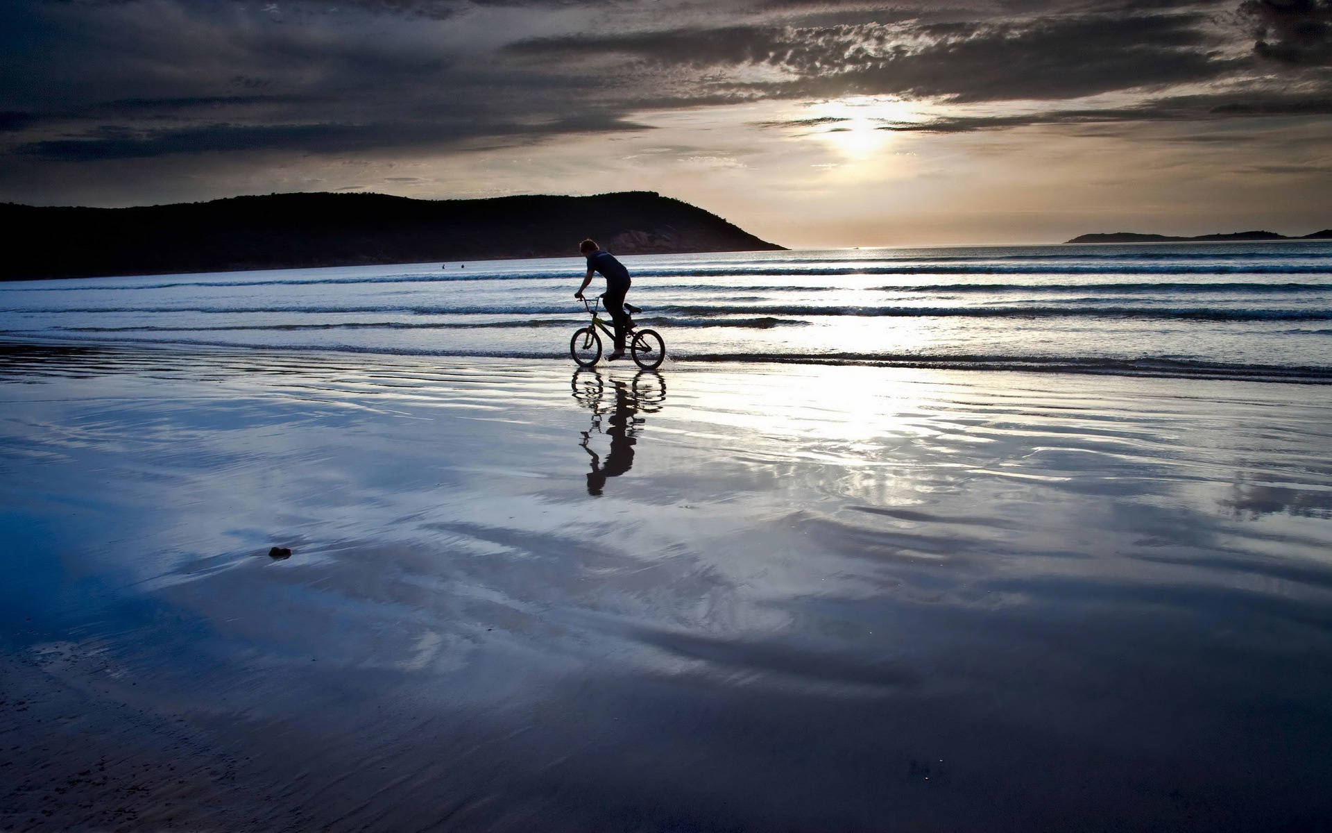 Riding Bicycle On Water Background